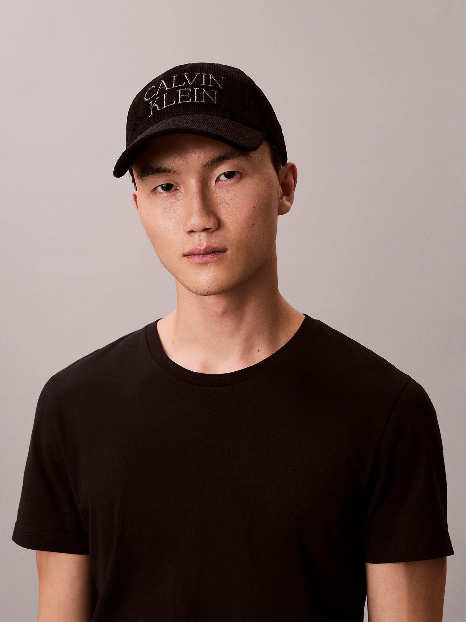 Product image 4 of 4, which shows Calvin Klein Logo Corduroy Baseball Cap, Black, One Size