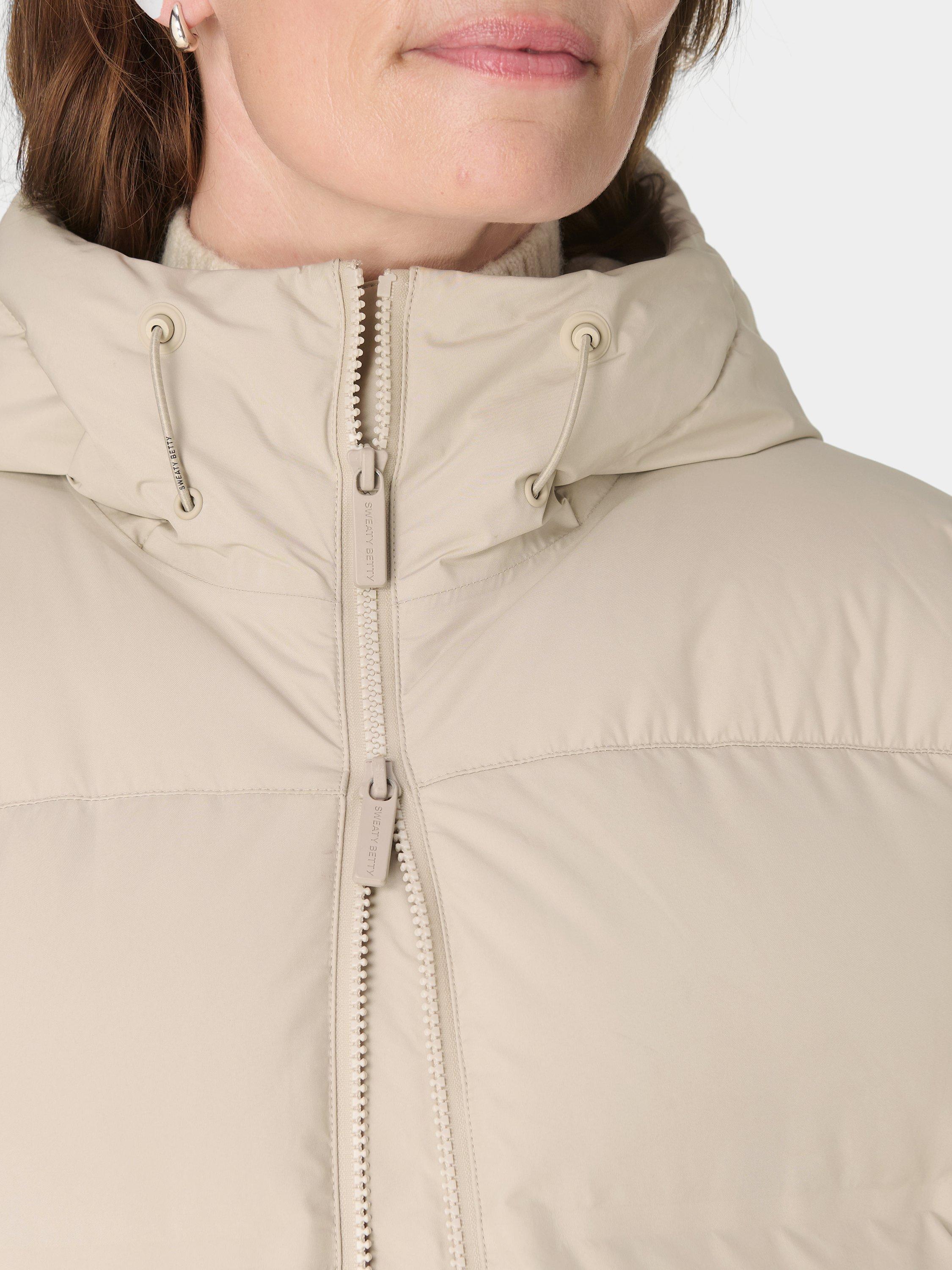 Product image 5 of 9, which shows Sweaty Betty Waterproof Puffer Coat, Dusk Beige, XL