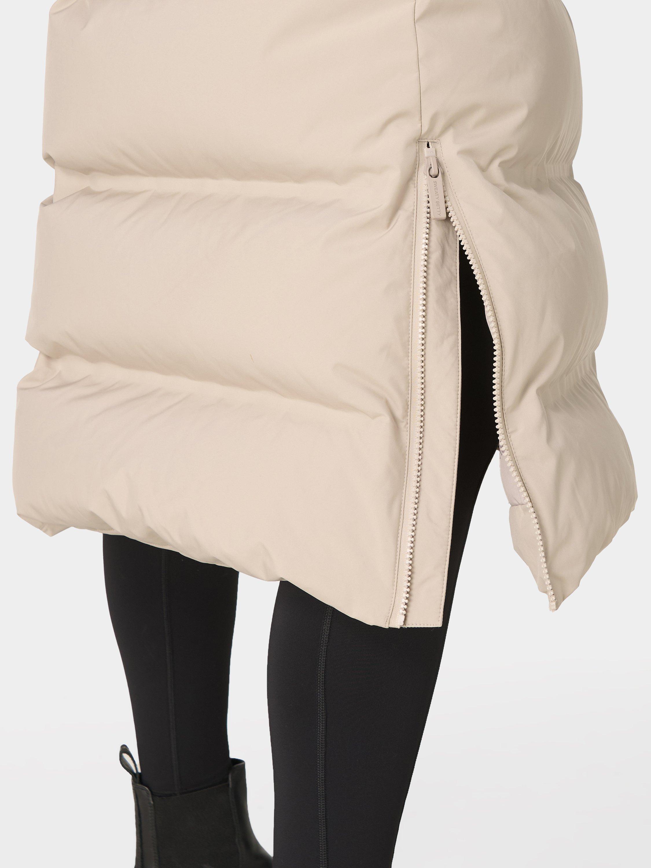 Product image 9 of 9, which shows Sweaty Betty Waterproof Puffer Coat, Dusk Beige, XL