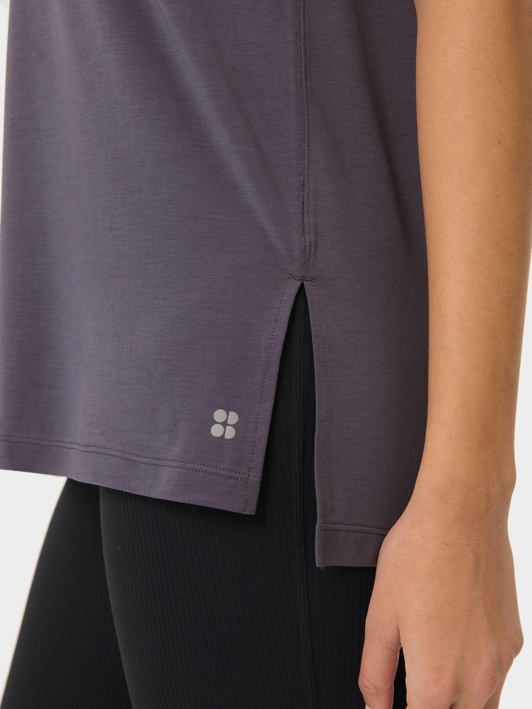 Product image 4 of 7, which shows Sweaty Betty Soft Flow Studio Longline T-Shirt, Nebula Blue, S