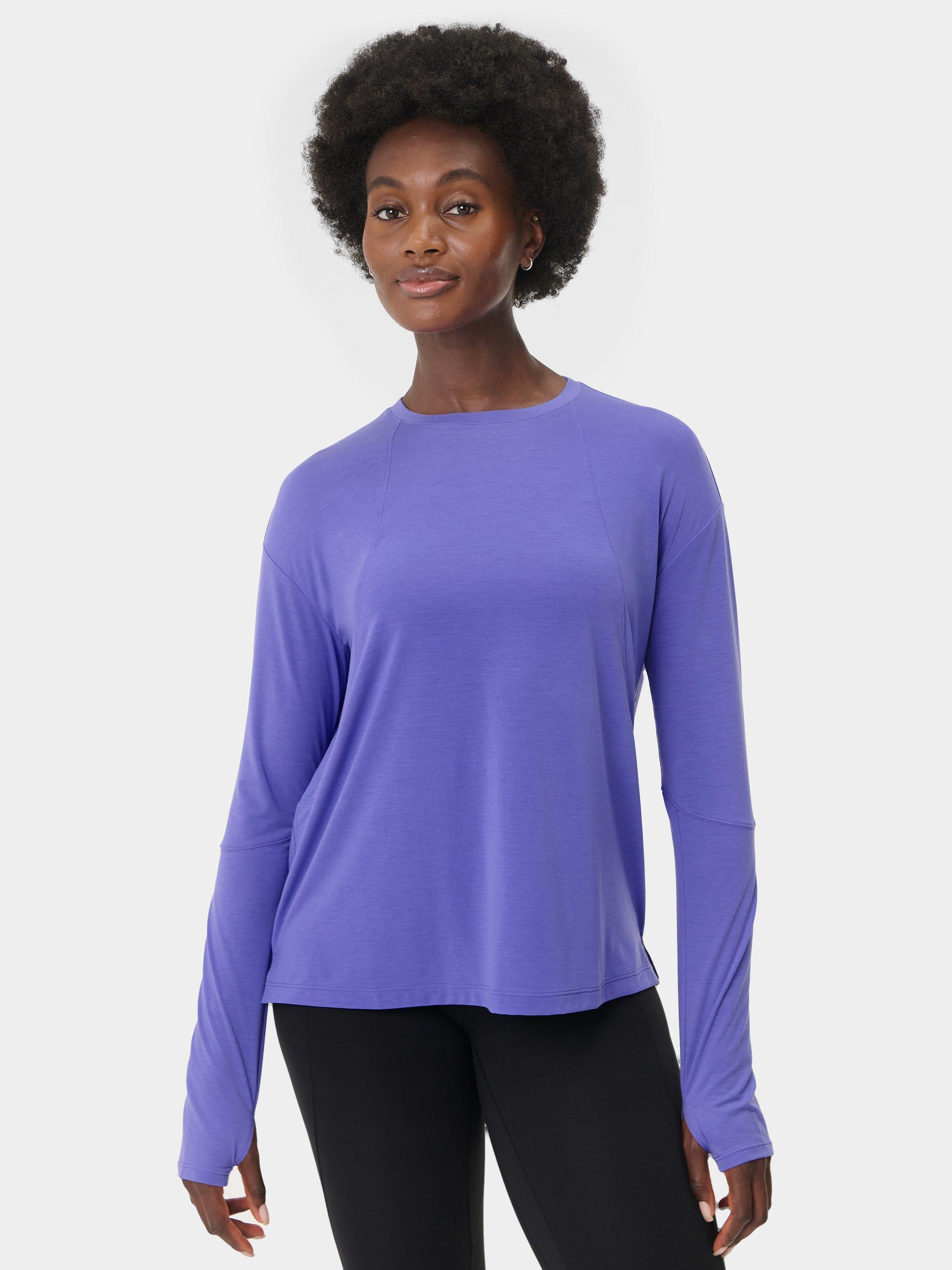 Product image 1 of 6, which shows Sweaty Betty Soft Flow Studio Long Sleeve Top, Aura Blue, XS