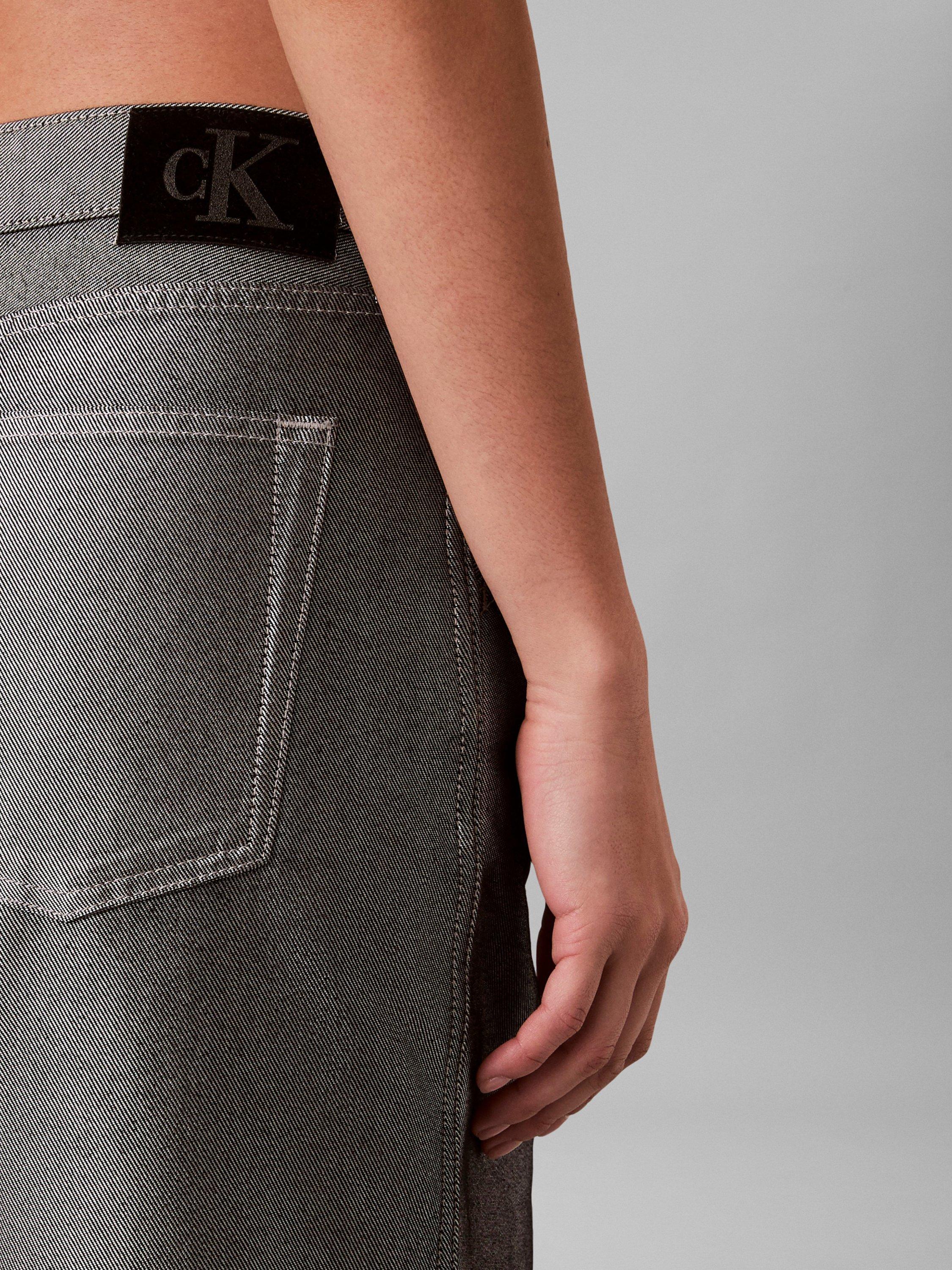 Product image 4 of 7, which shows Calvin Klein High Rise Tapered Jeans, Silver Shine, 28L