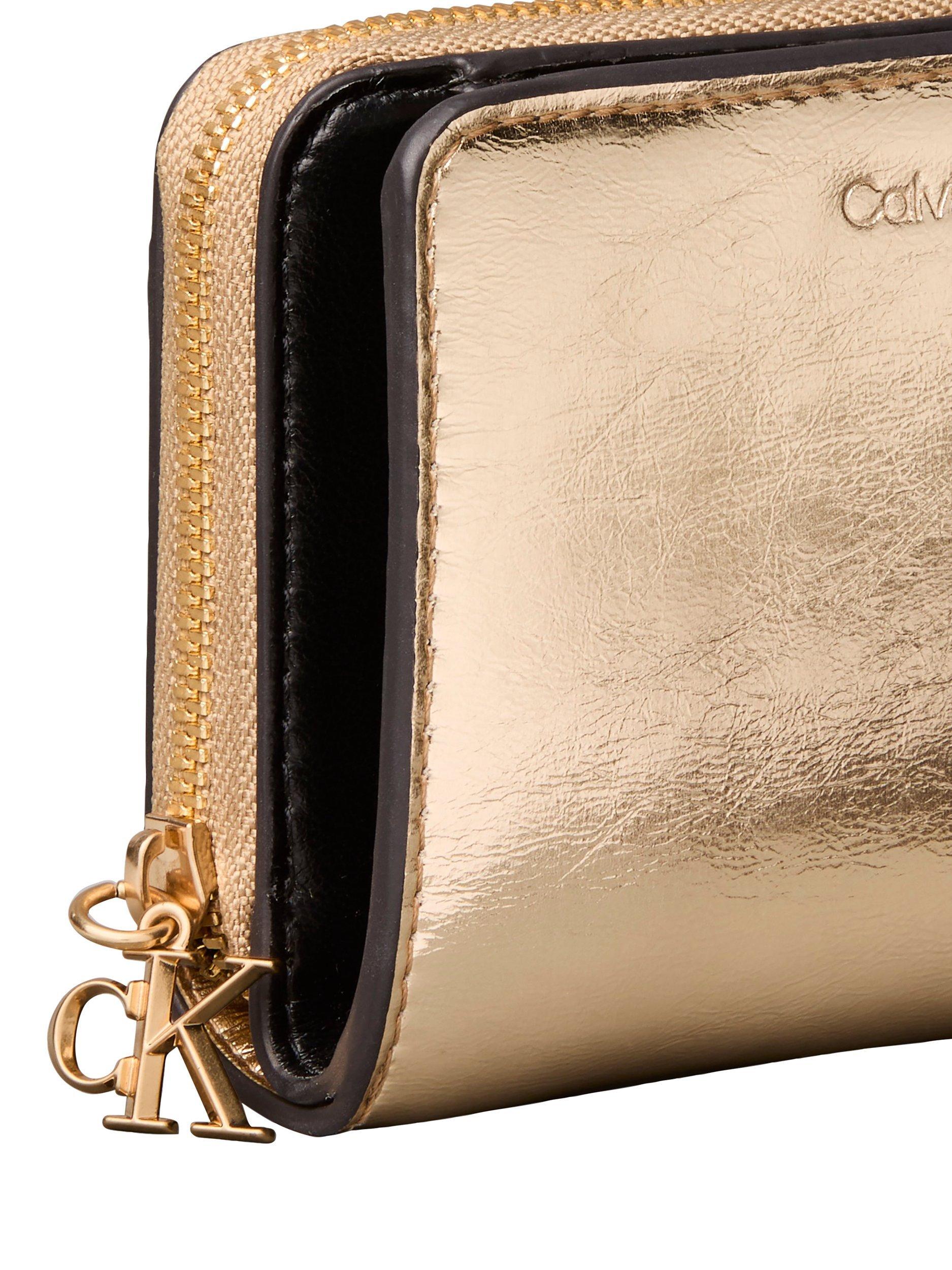 Product image 4 of 4, which shows Calvin Klein Embossed Logo Metallic Purse, Gold, One Size