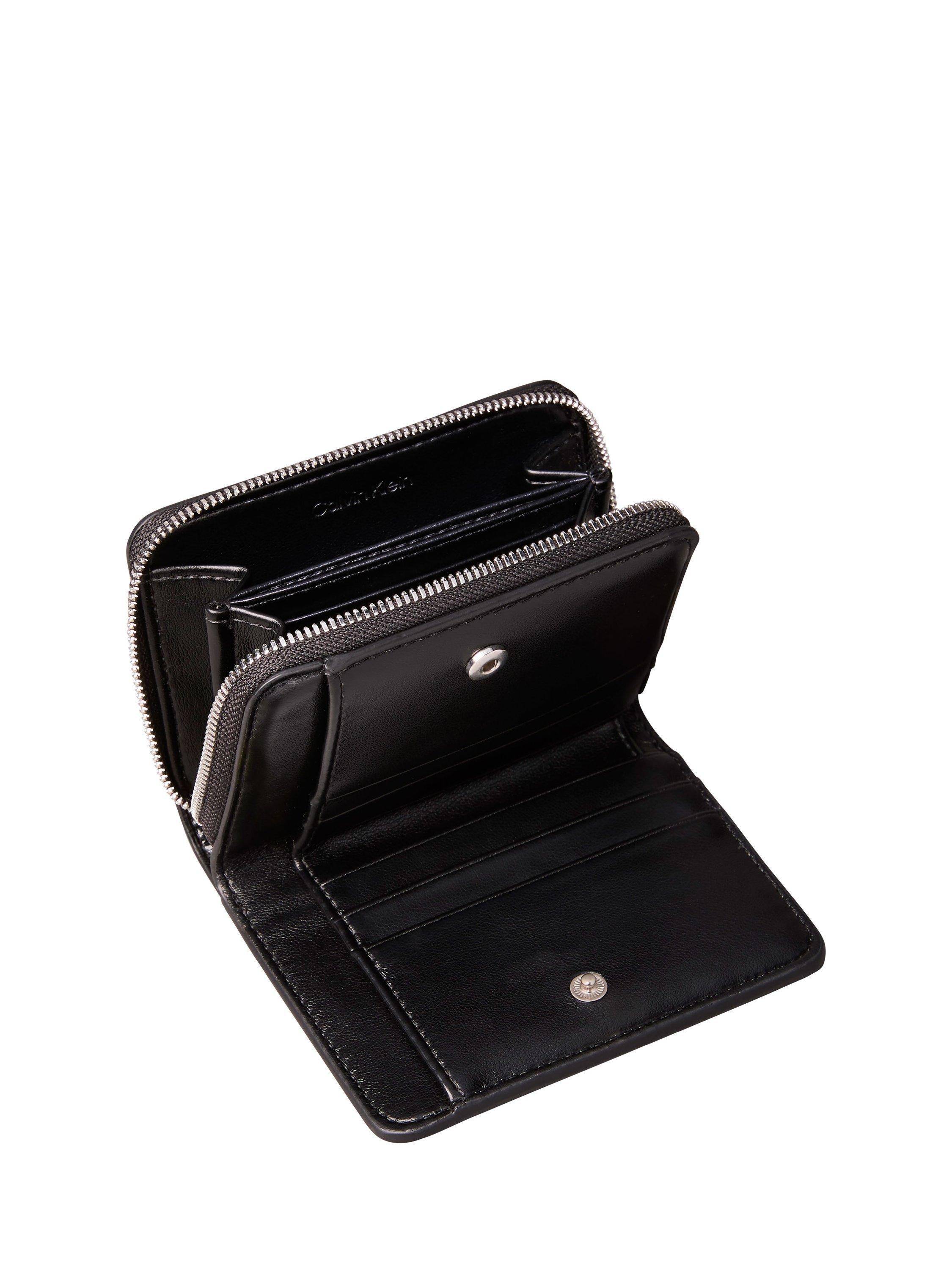 Product image 3 of 4, which shows Calvin Klein Embossed Logo Metallic Purse, Black, One Size