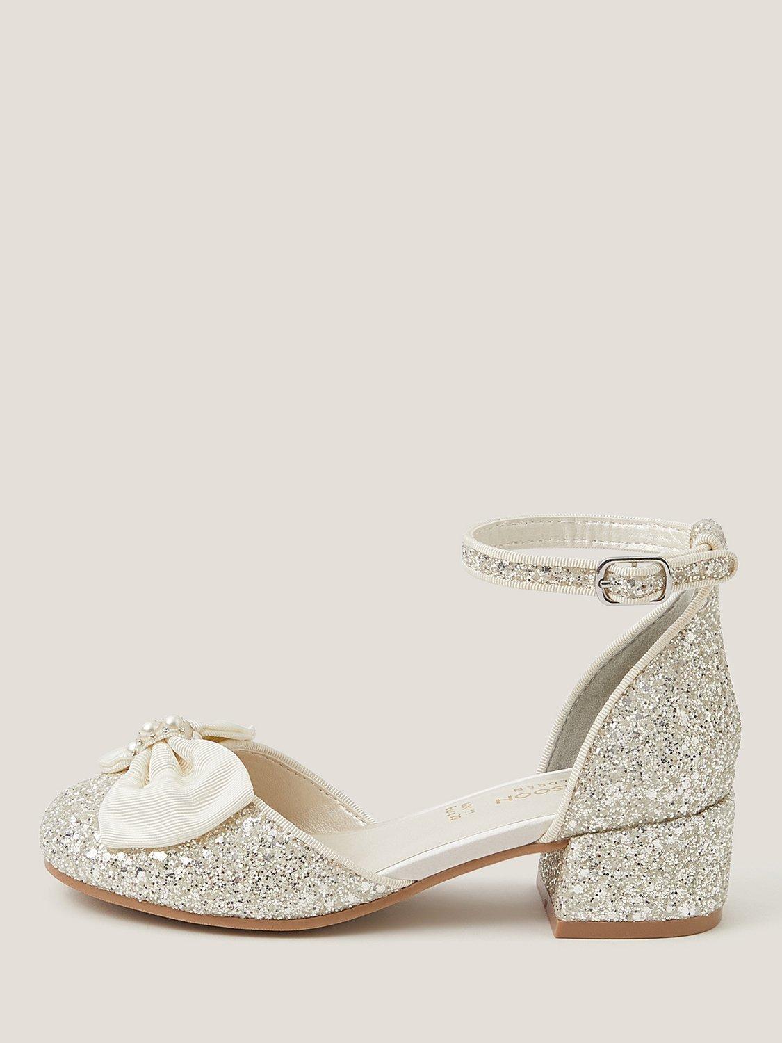 Product image 1 of 3, which shows Monsoon Kids' Bow Glitter Chunky Heels, Ivory, 7 Jnr