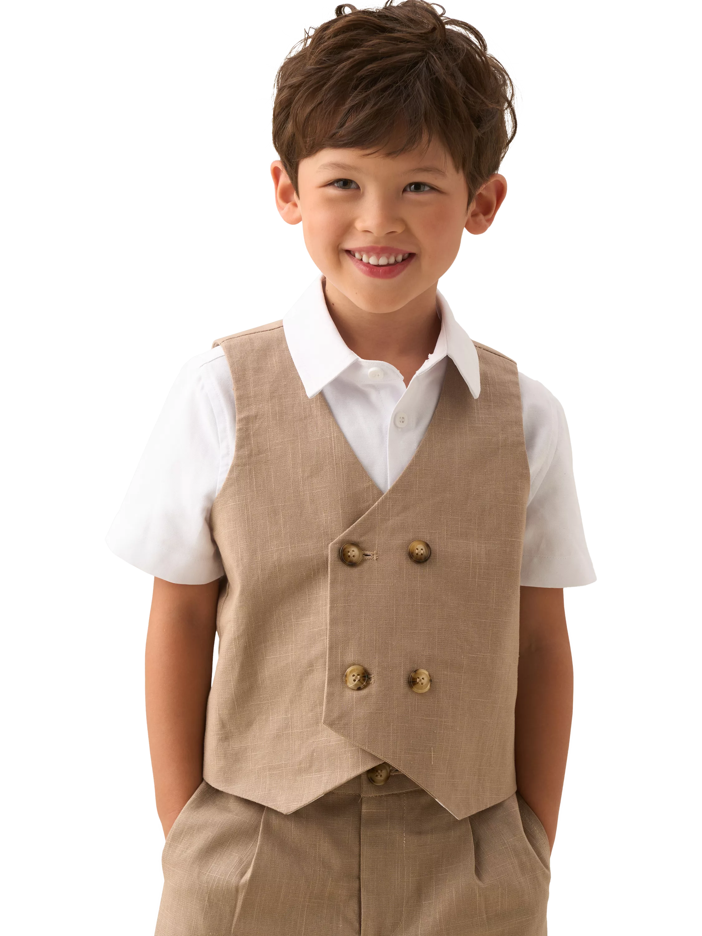 young boy wearing a beige waistcoat and tailored trousers with a short sleeve white shirt