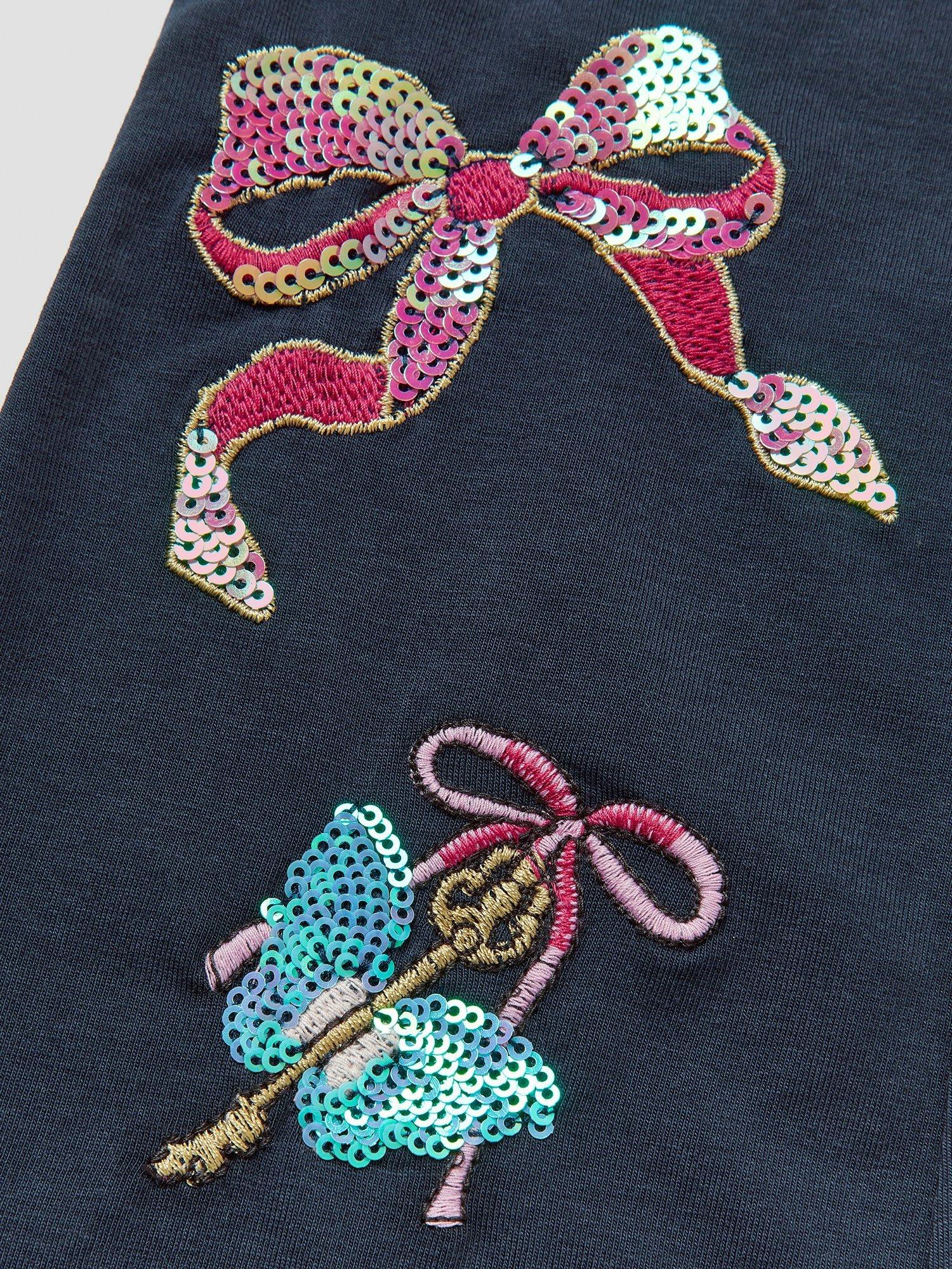 Product image 3 of 4, which shows Monsoon Kids' Sequin Bow Embellished Flared Leggings, Navy, 3-4 years