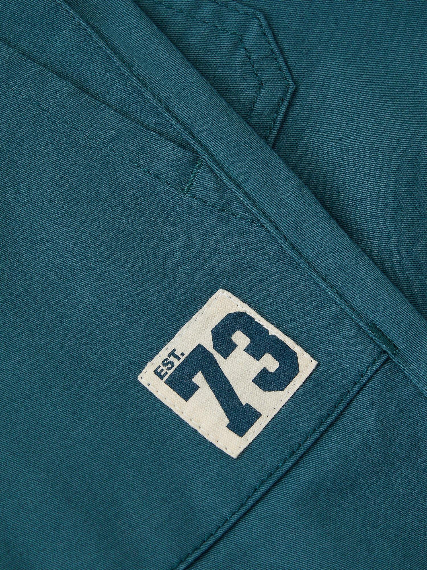 Product image 2 of 3, which shows Monsoon Kids' Cotton Rich Drawstring Cuffed Trousers, Blue, 2-3 years