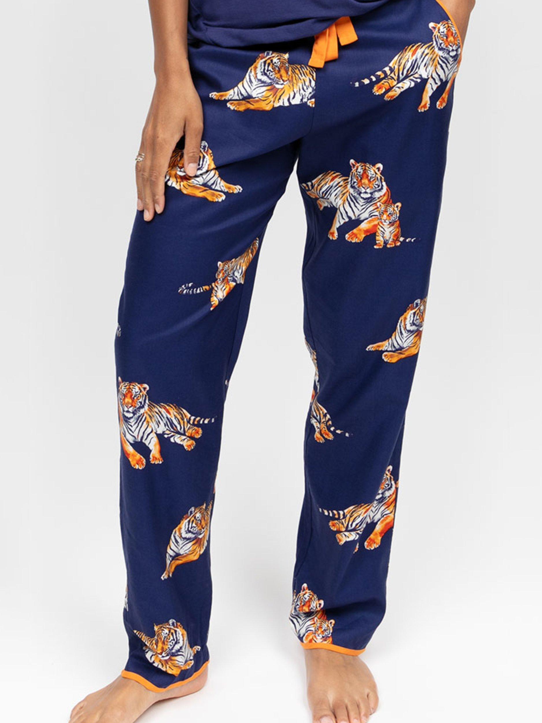 Product image 1 of 4, which shows Cyberjammies Indigo Tiger Print Pyjama Bottoms, Navy/Multi, 6