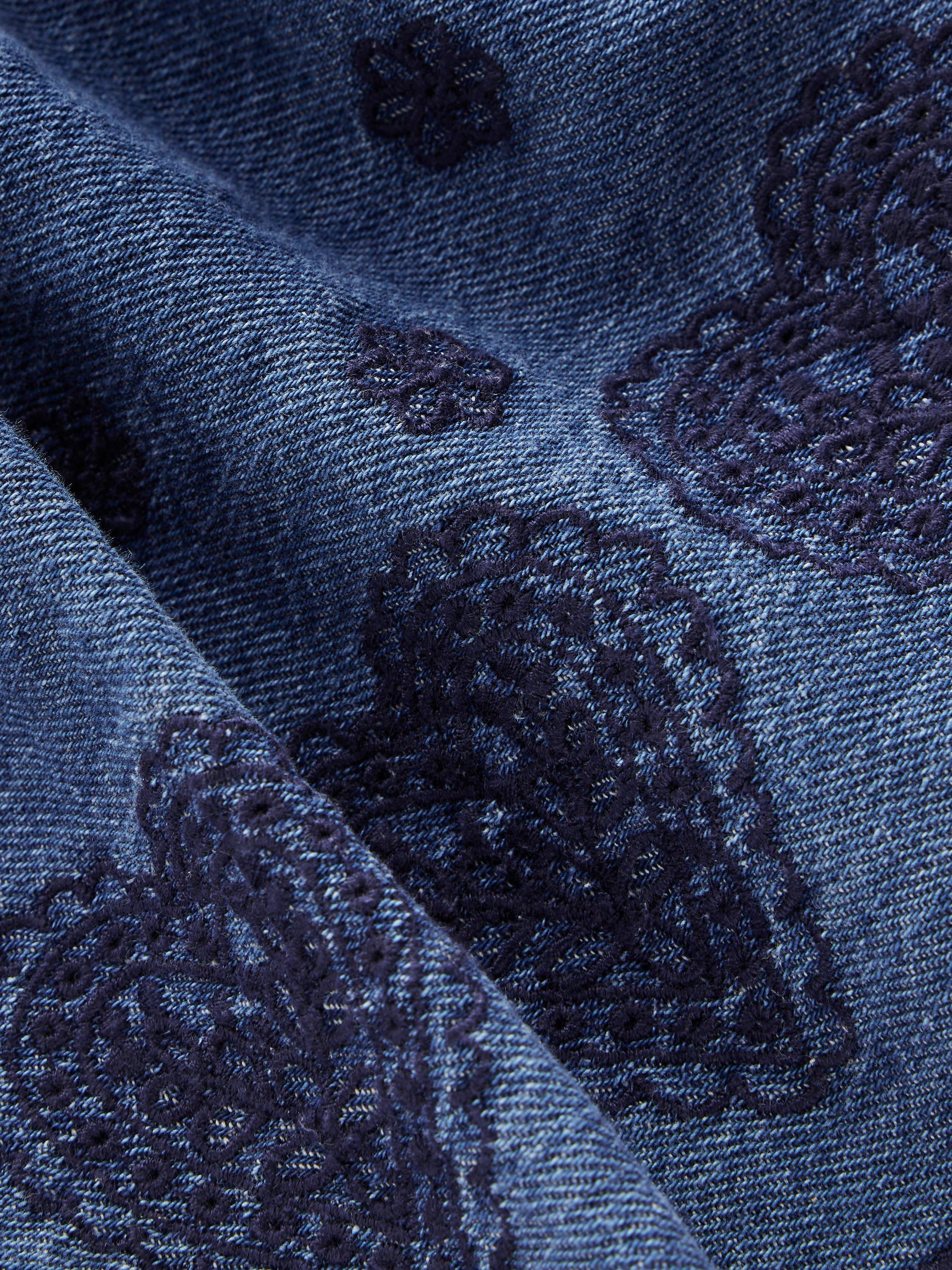 Product image 3 of 3, which shows Mini Boden Kids' Embro Pull On Embroidered Skirt, Chambray, 2-3 years