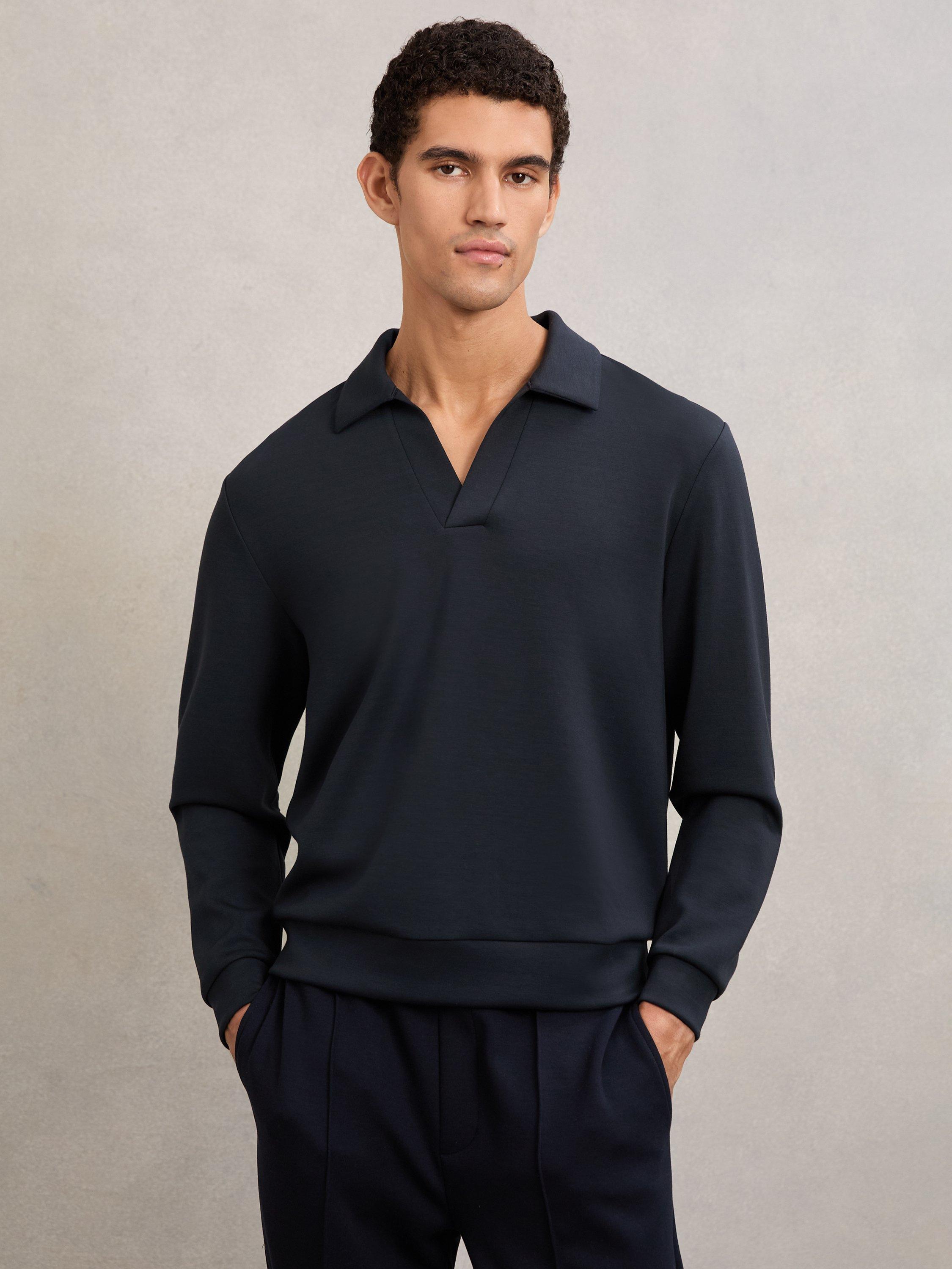 Product image 1 of 5, which shows Reiss Pearson Buttonless Long Sleeve Polo Shirt, Navy Blue, XL