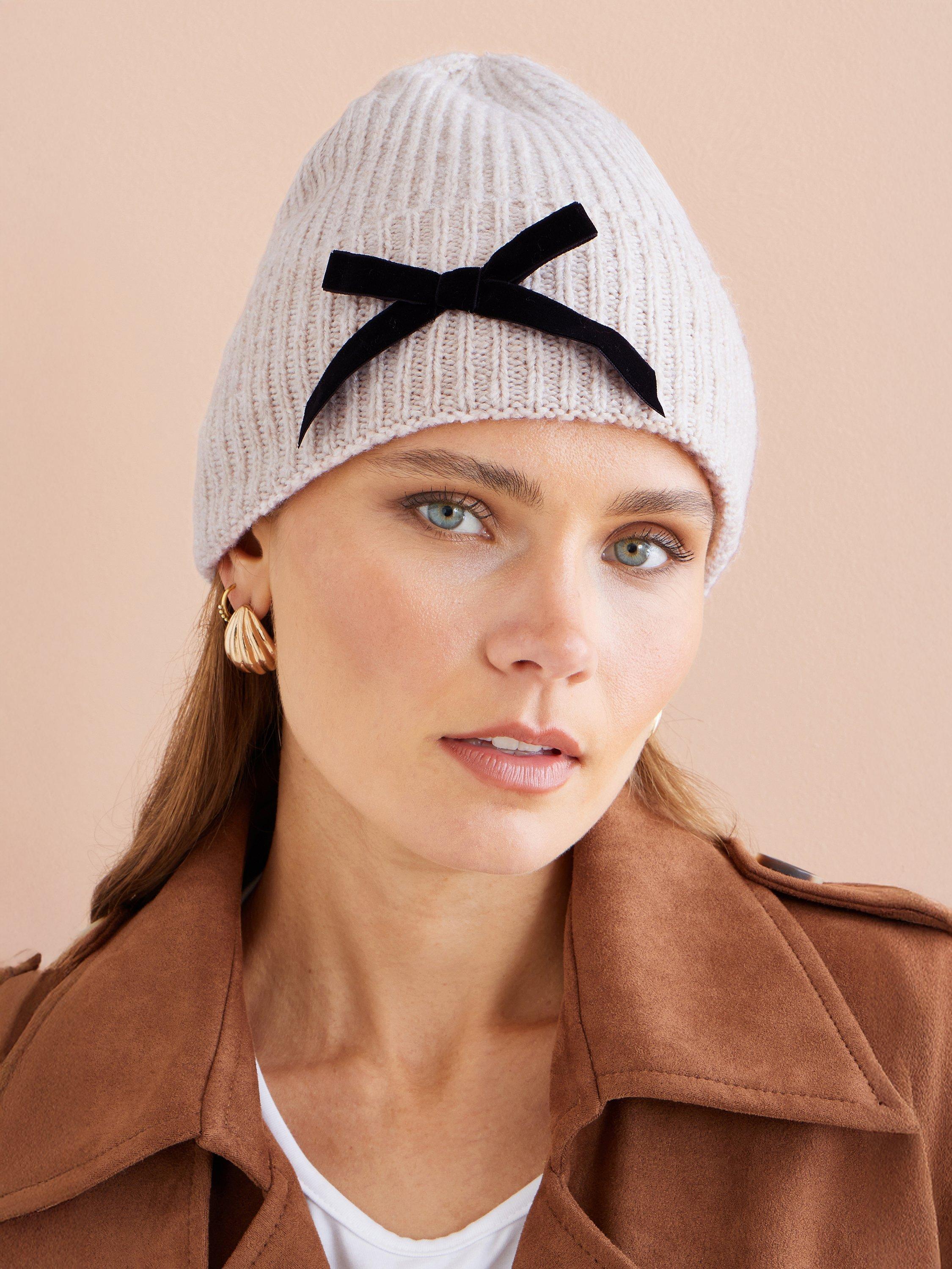 Product image 1 of 2, which shows Yumi Bow Knit Beanie Hat, Oatmeal, One Size