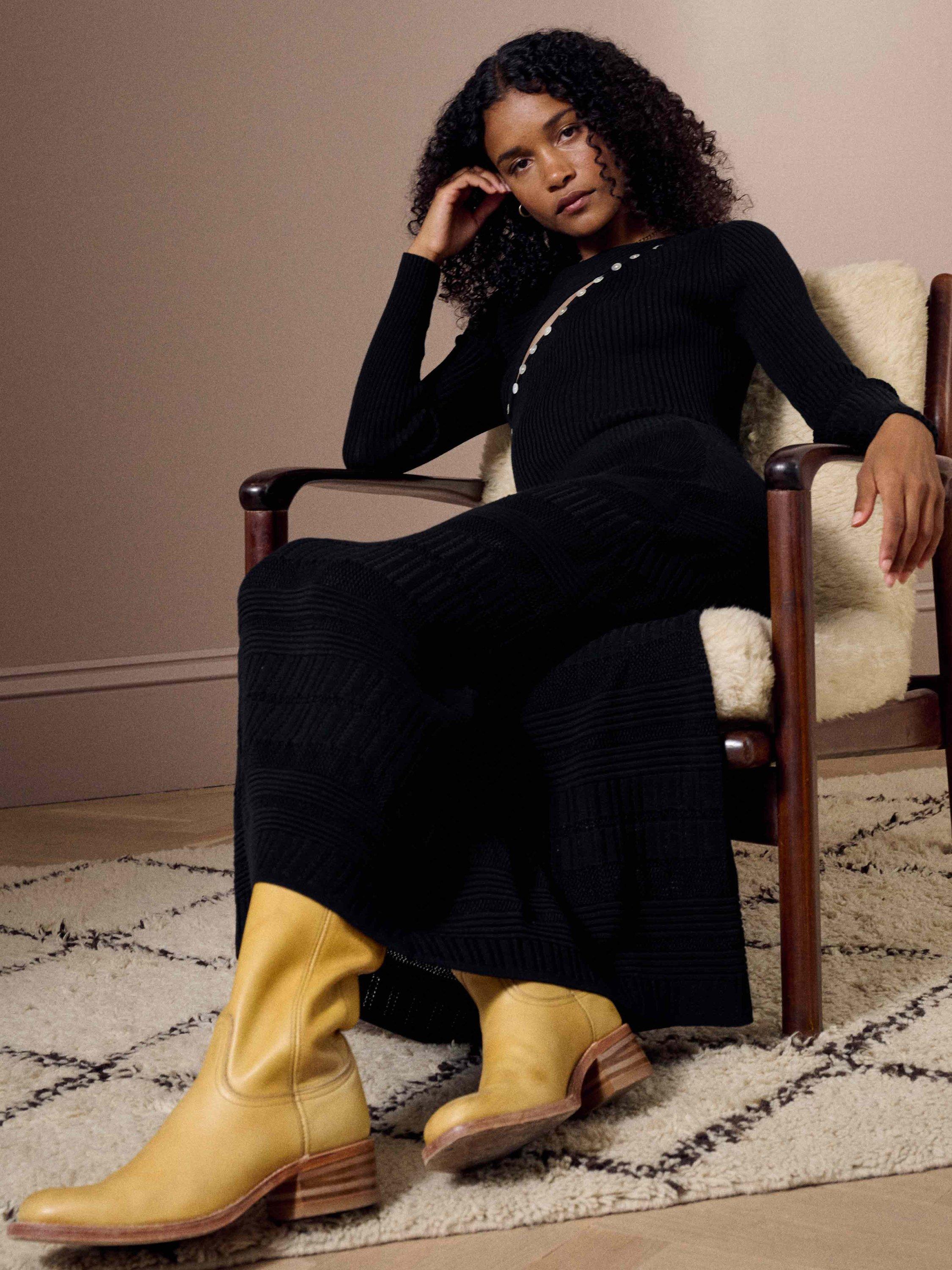 Product image 2 of 5, which shows Brora Sheer Panel Knitted Midi Skirt, Black, 8-10