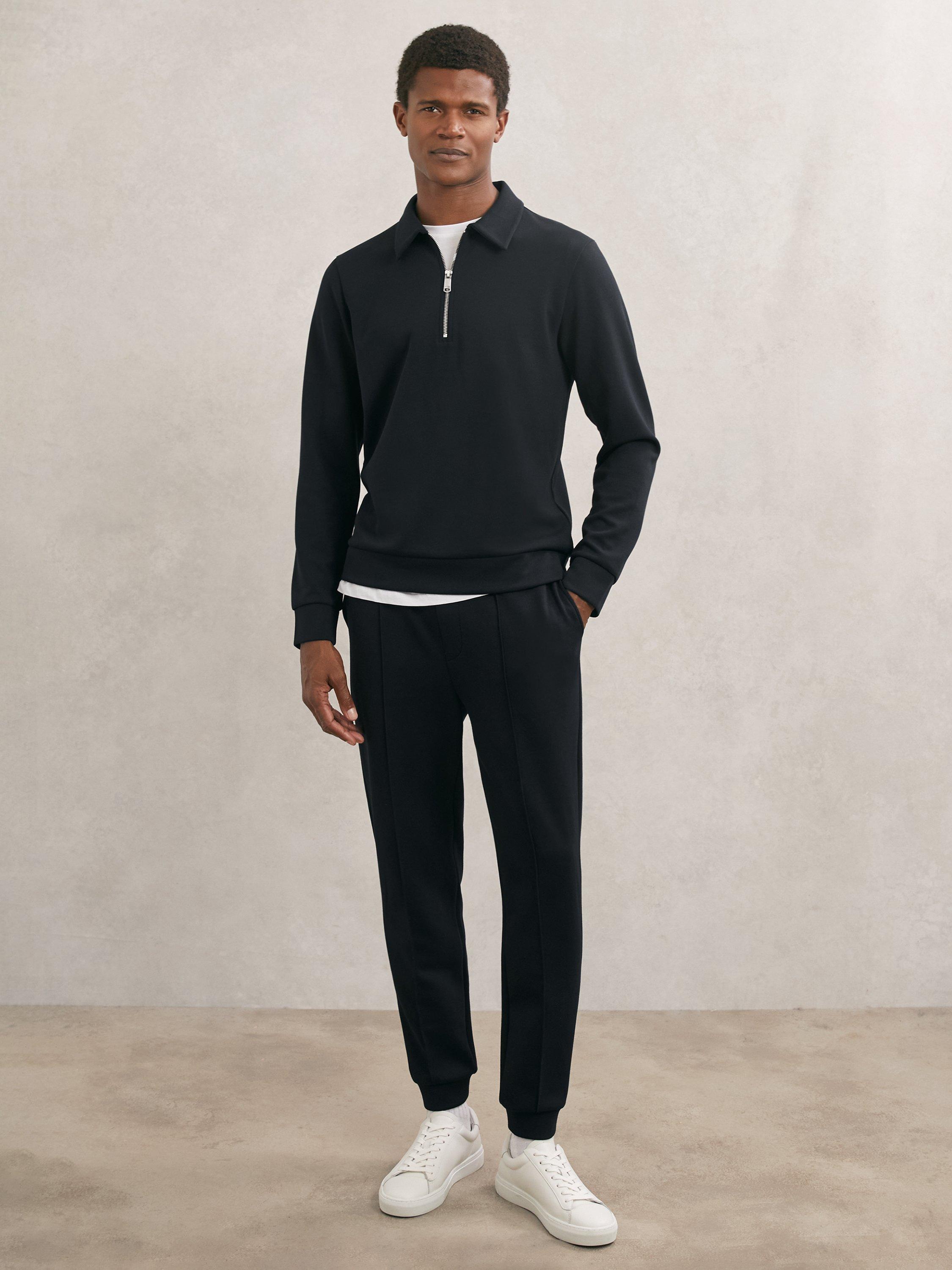 Product image 4 of 5, which shows Reiss Prince Interlock Half Zip Polo Sweatshirt, Navy Blue, XS