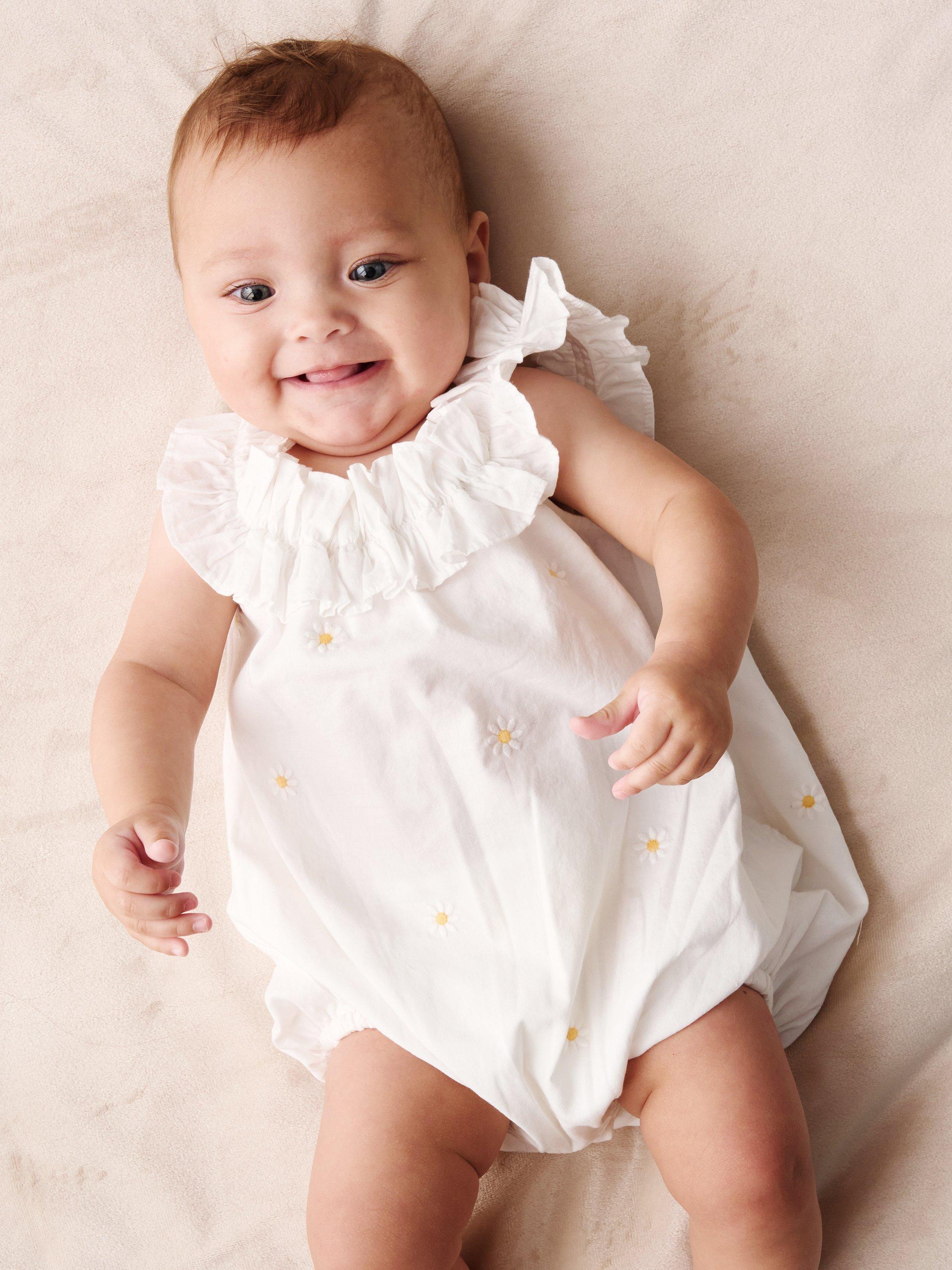 Product image 3 of 3, which shows Angel & Rocket Baby Cotton Daisy Frill Romper, White, 0-3 months