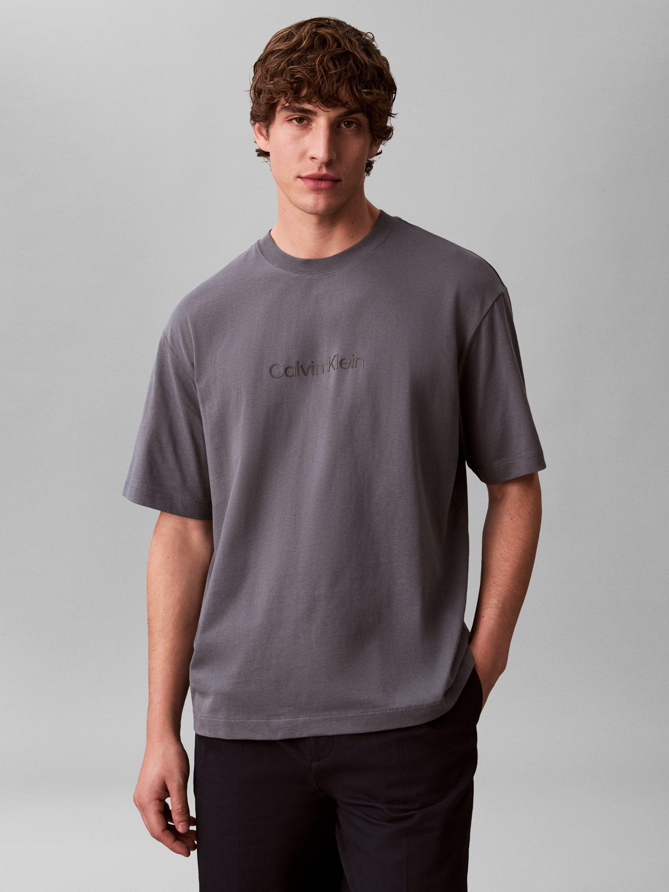 Product image 1 of 6, which shows Calvin Klein Relaxed Standard T-Shirt, Anchor Navy, XS