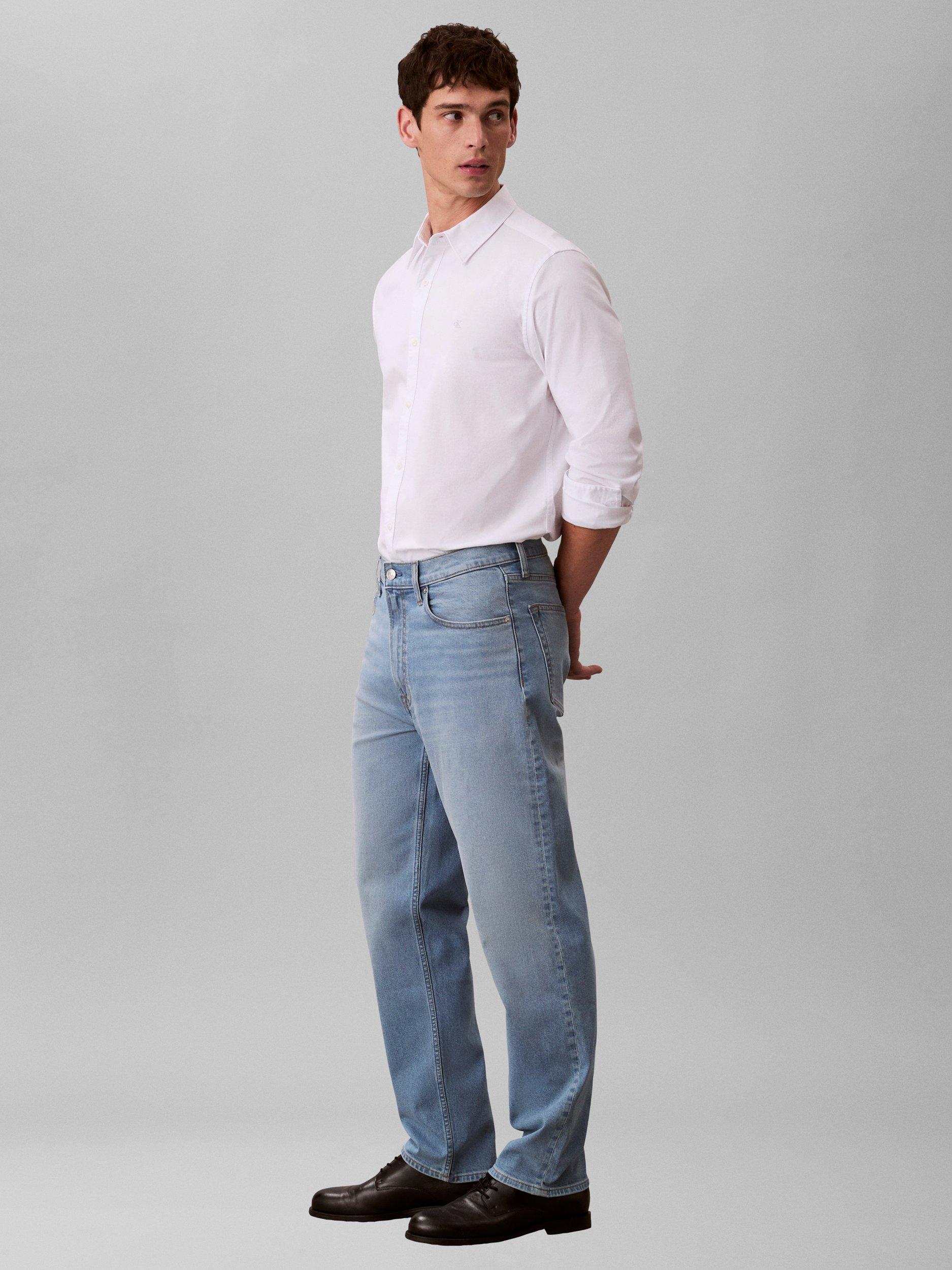 Product image 5 of 6, which shows Calvin Klein 90S Taper Leg Jeans, Ashland, W28/L32