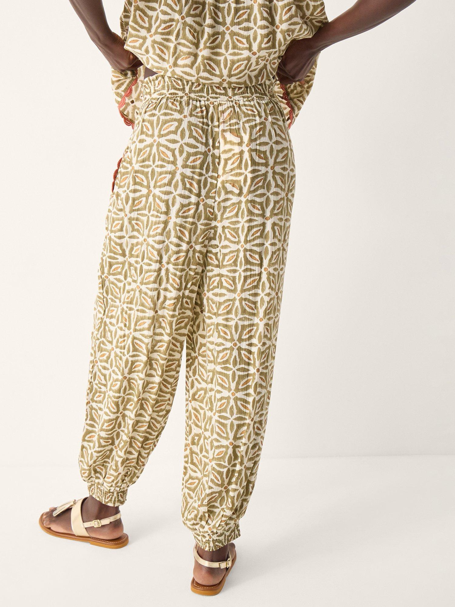 Product image 2 of 5, which shows Monsoon Elma Floral Harem Trousers, Khaki, S