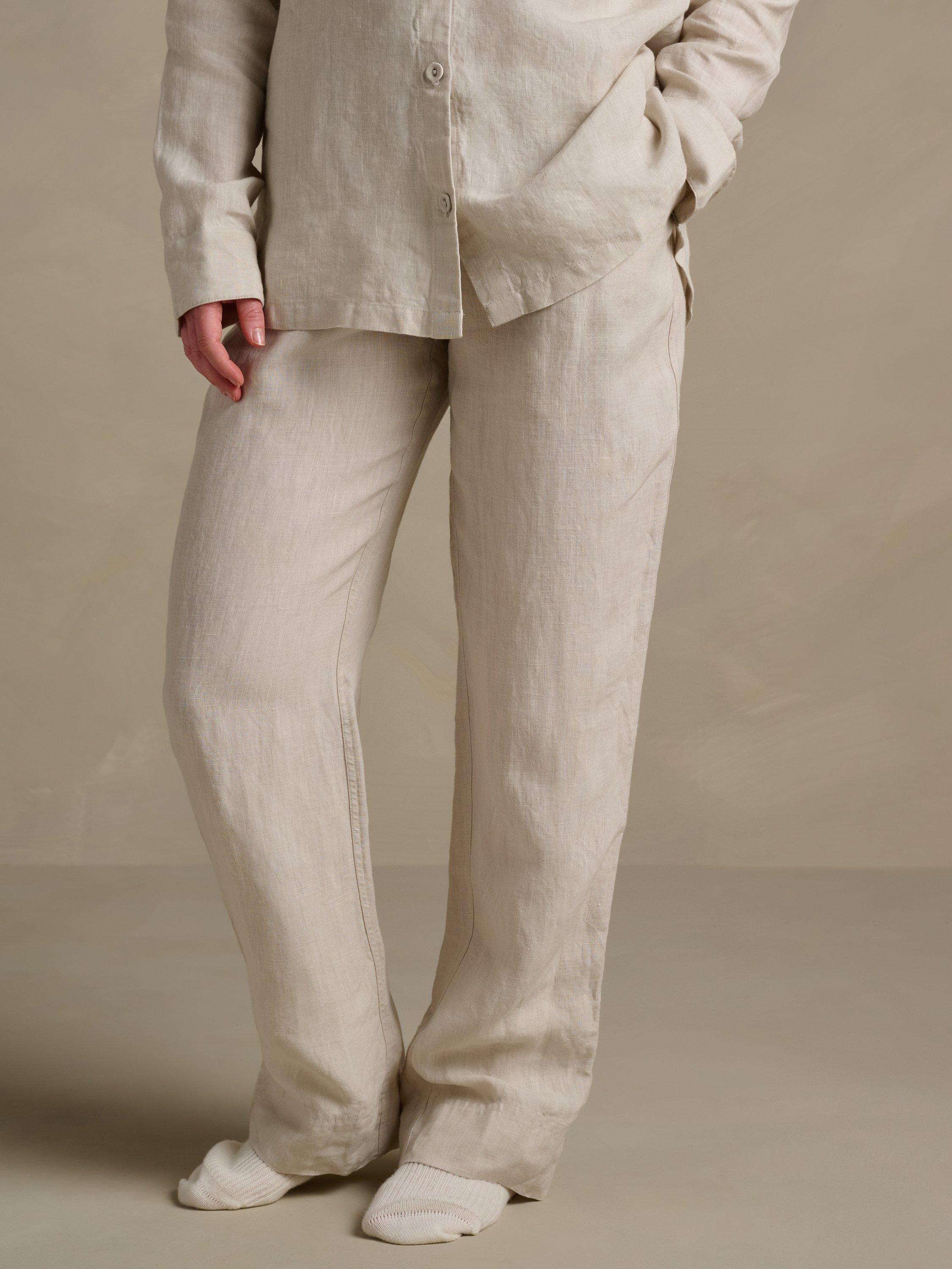Product image 1 of 6, which shows Bedfolk Relaxed Pure Linen Trousers, Clay, XS