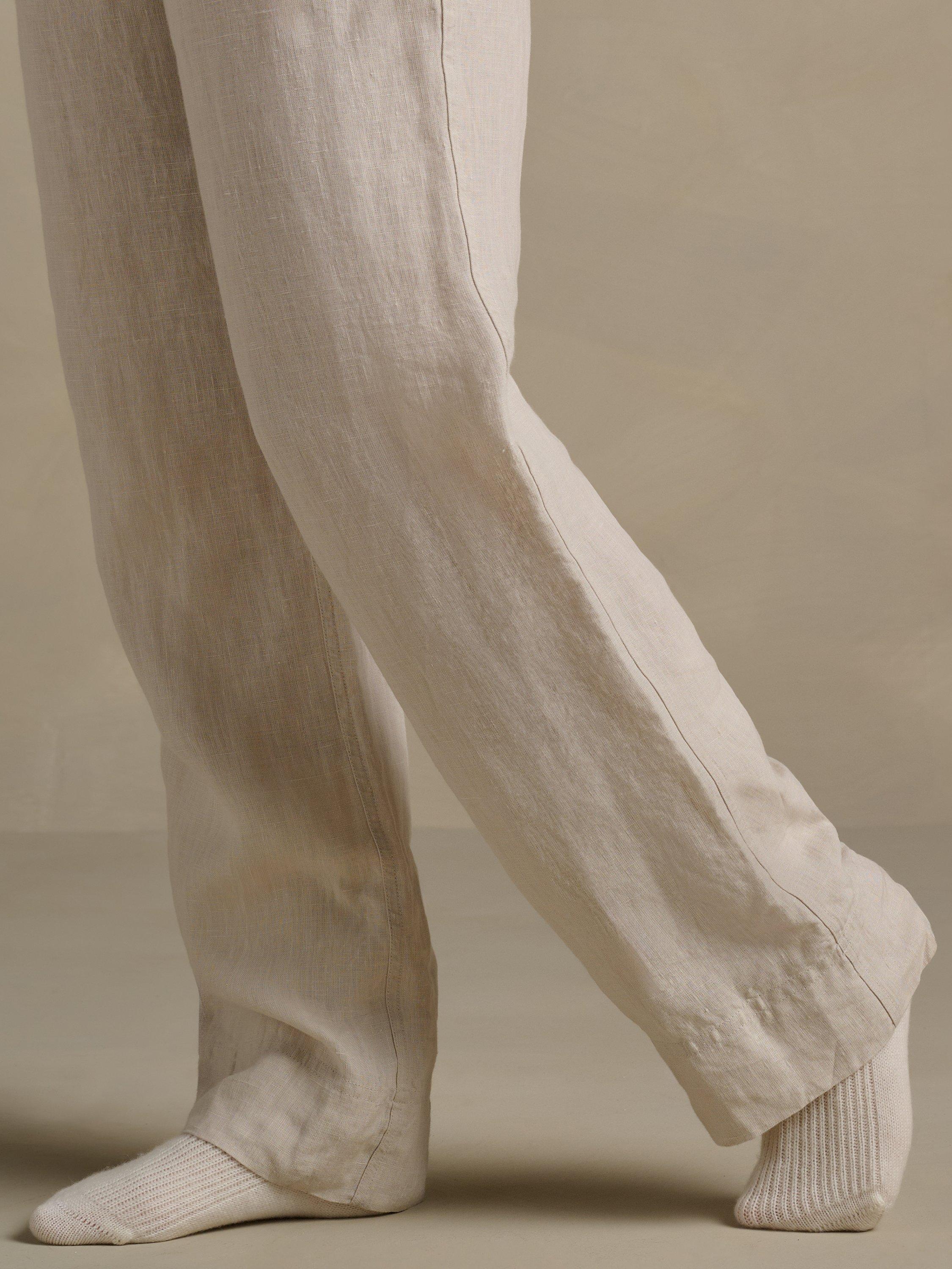 Product image 4 of 6, which shows Bedfolk Relaxed Pure Linen Trousers, Clay, XS