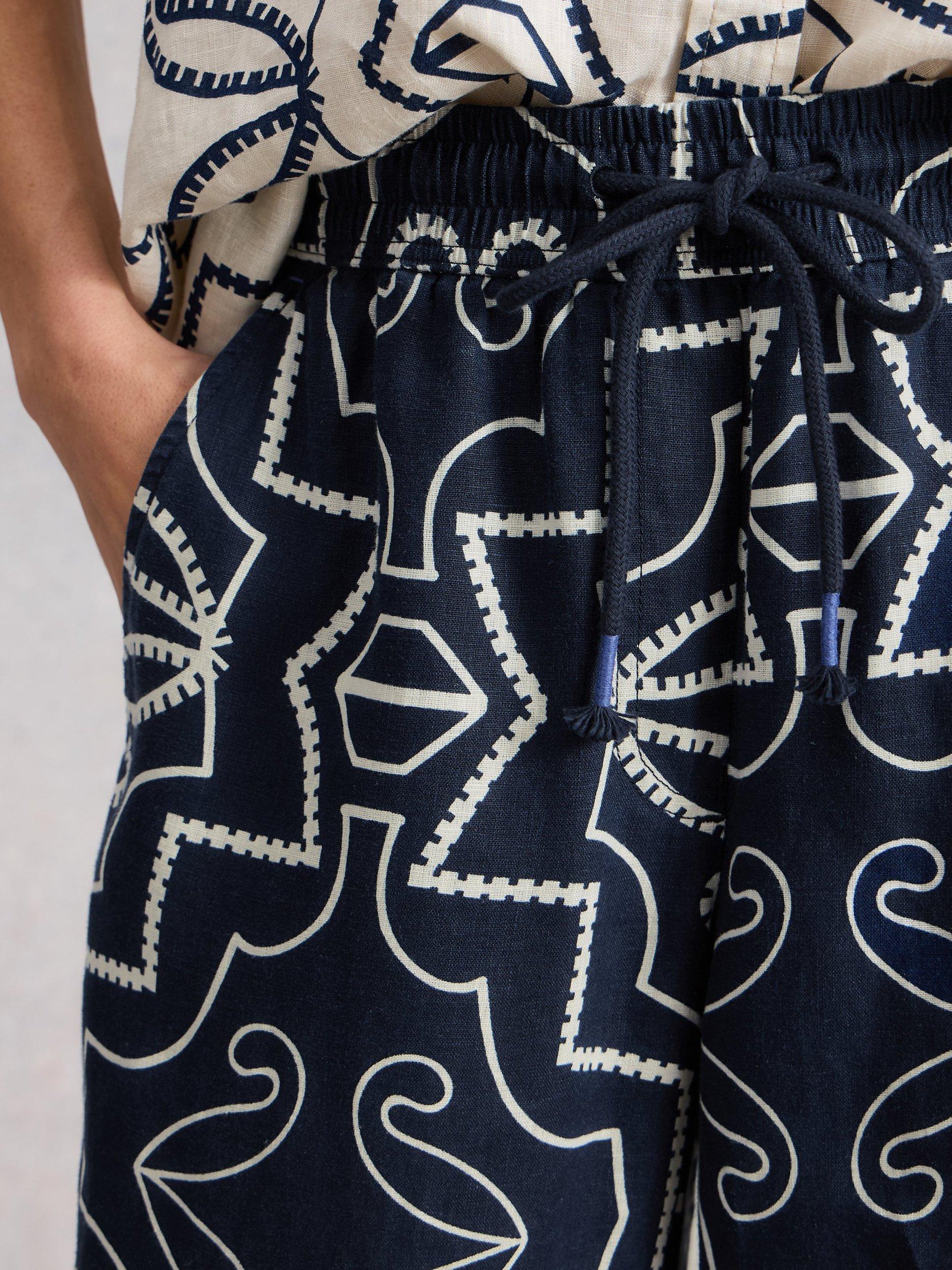 Product image 3 of 6, which shows White Stuff Ally Abstract Pure Linen Trousers, Navy/White, 6S