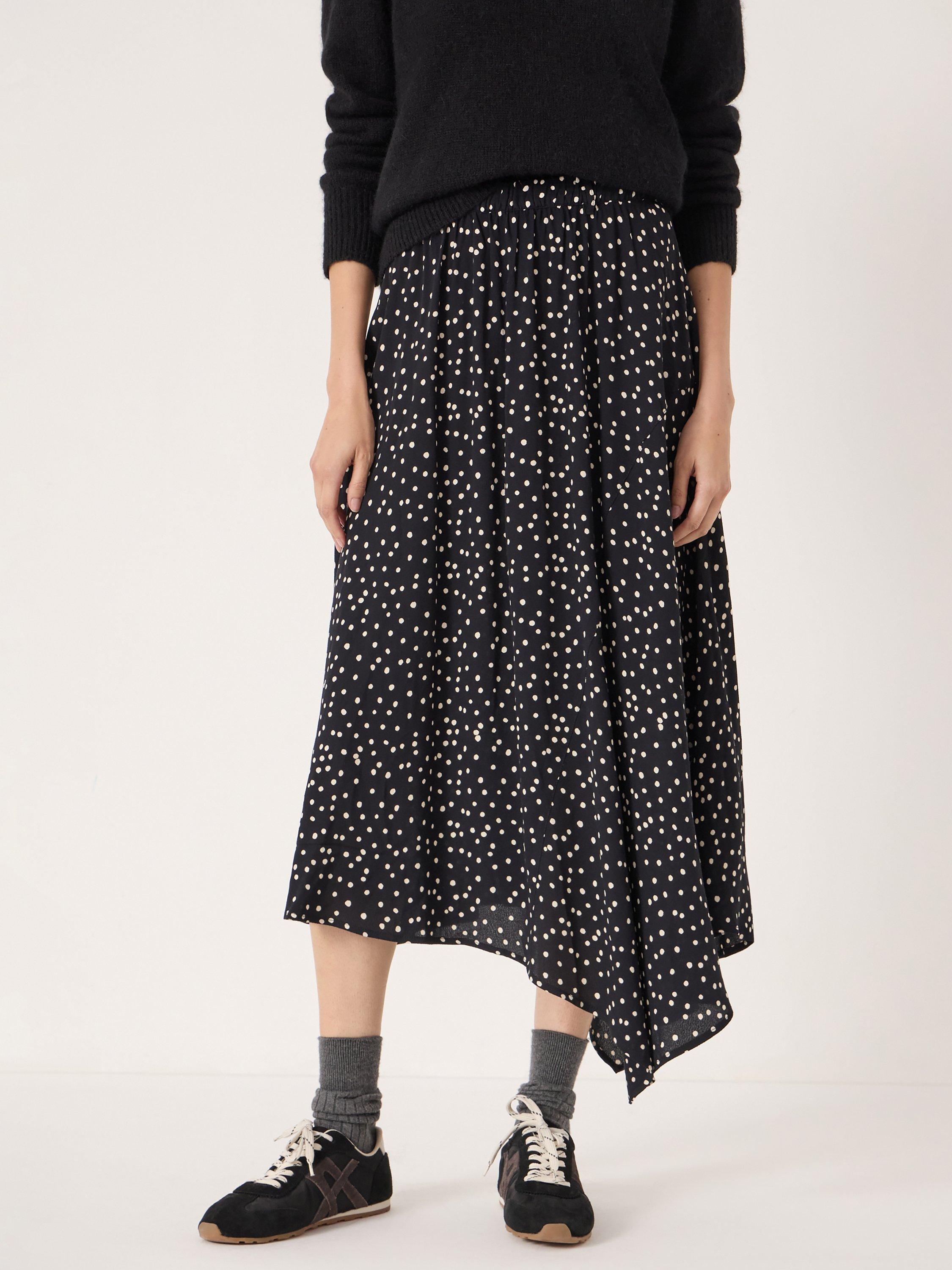 Product image 1 of 6, which shows HUSH Cesca Polka Dot Asymmetric Skirt, Black/White, L-XL