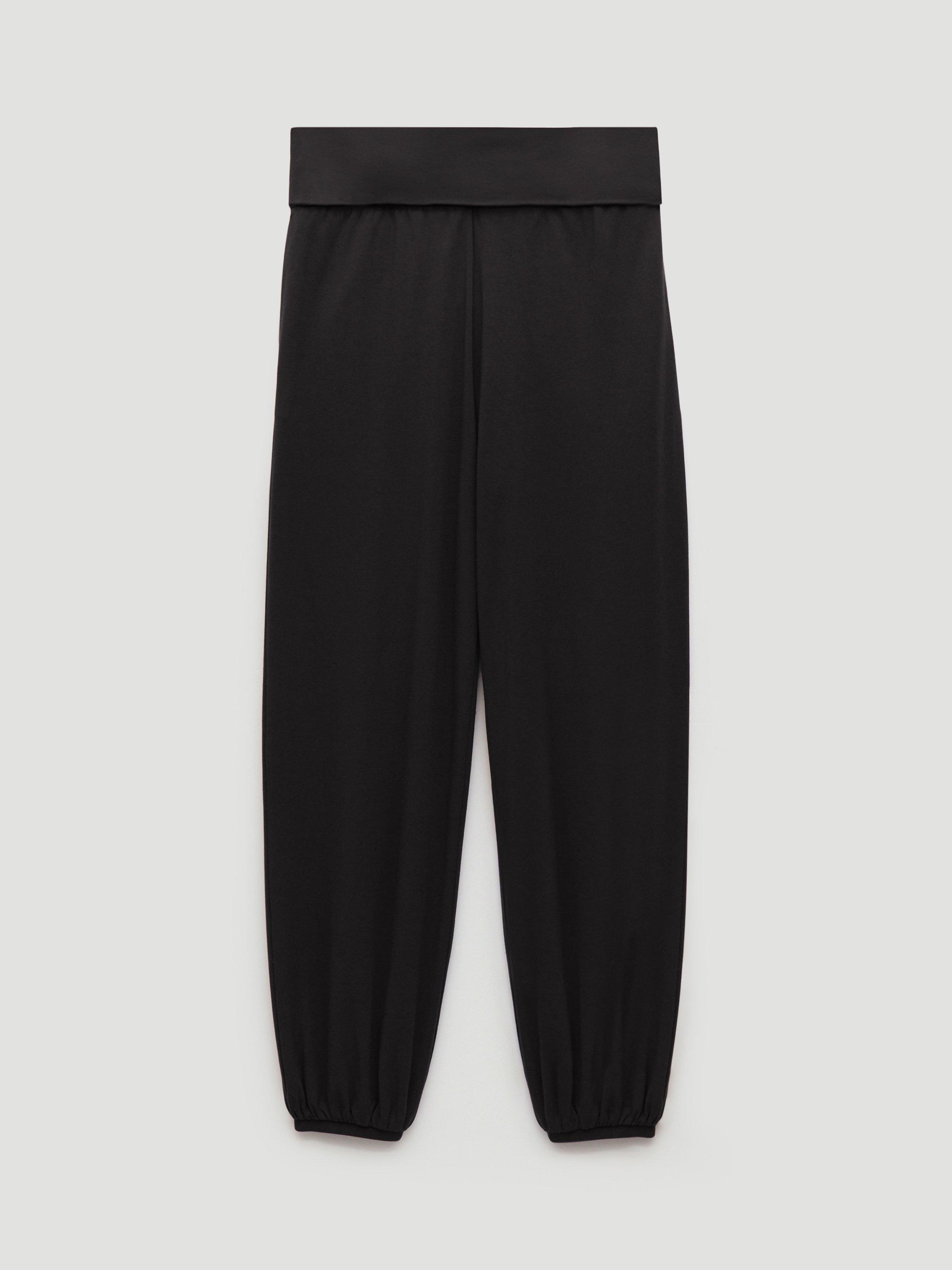 Product image 4 of 5, which shows HUSH Amelia Bubble Hem Trousers, Black, L-XL
