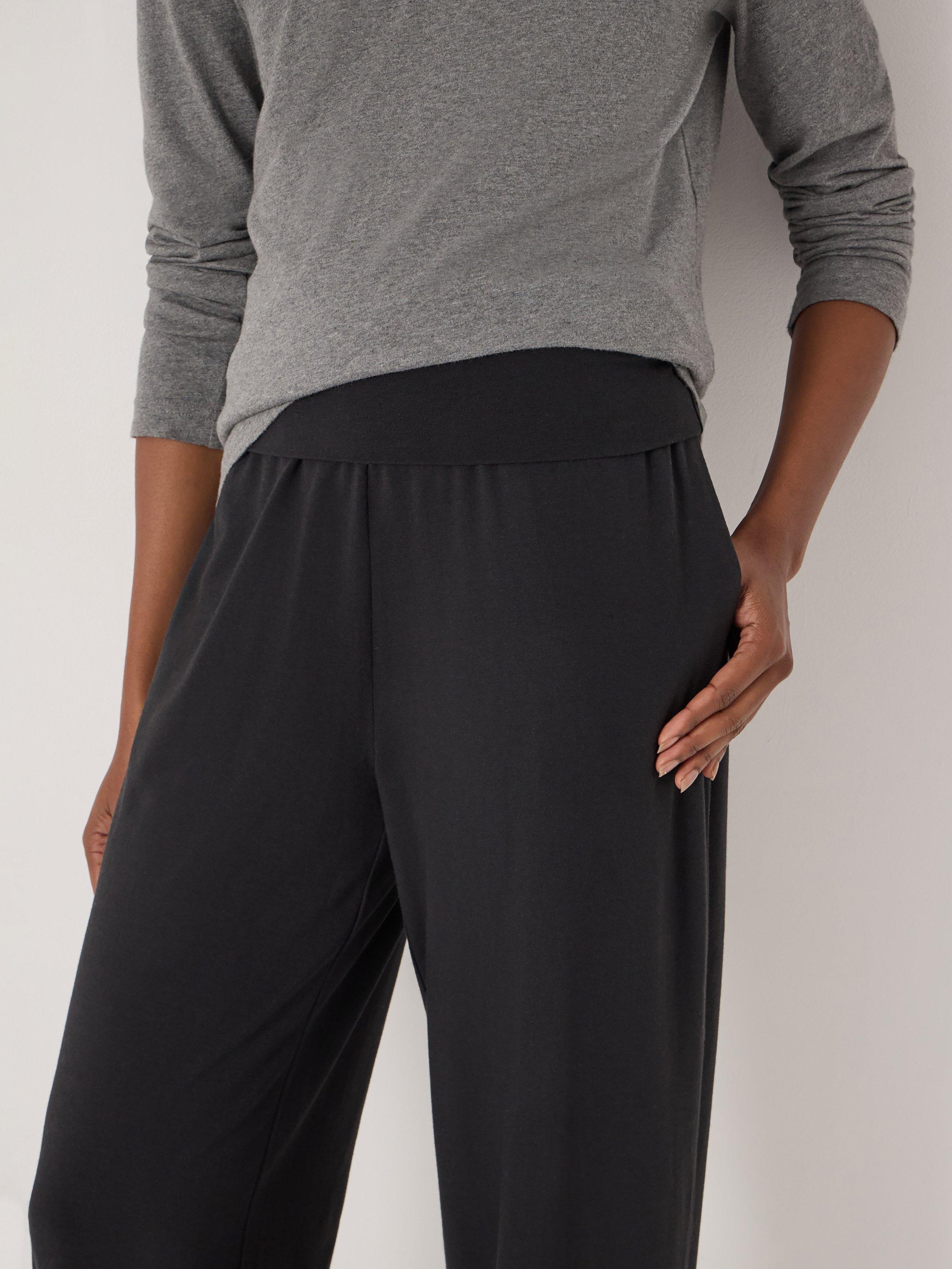 Product image 5 of 5, which shows HUSH Amelia Bubble Hem Trousers, Black, L-XL