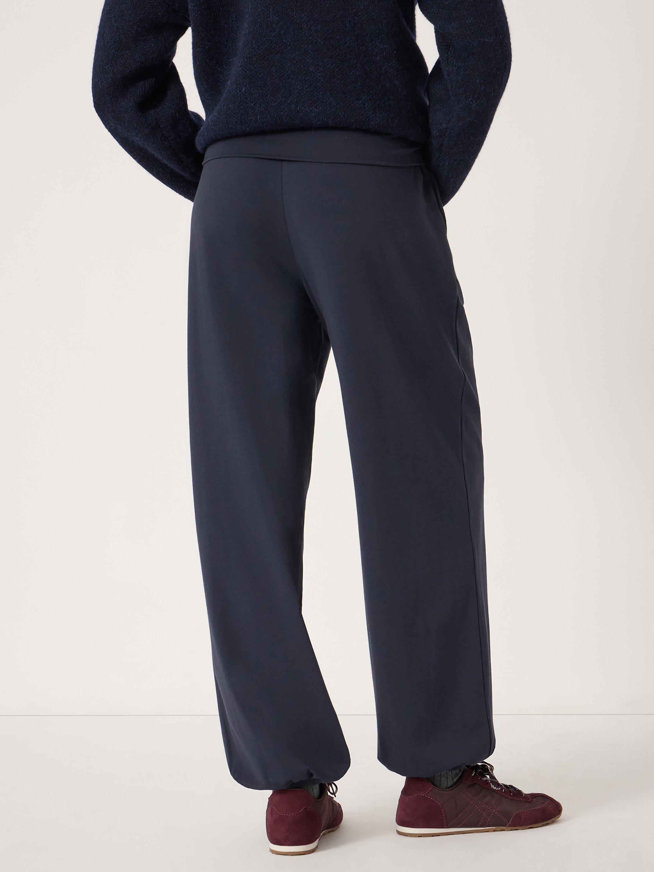 Product image 3 of 5, which shows HUSH Amelia Bubble Hem Trousers, Midnight Navy, XS-S
