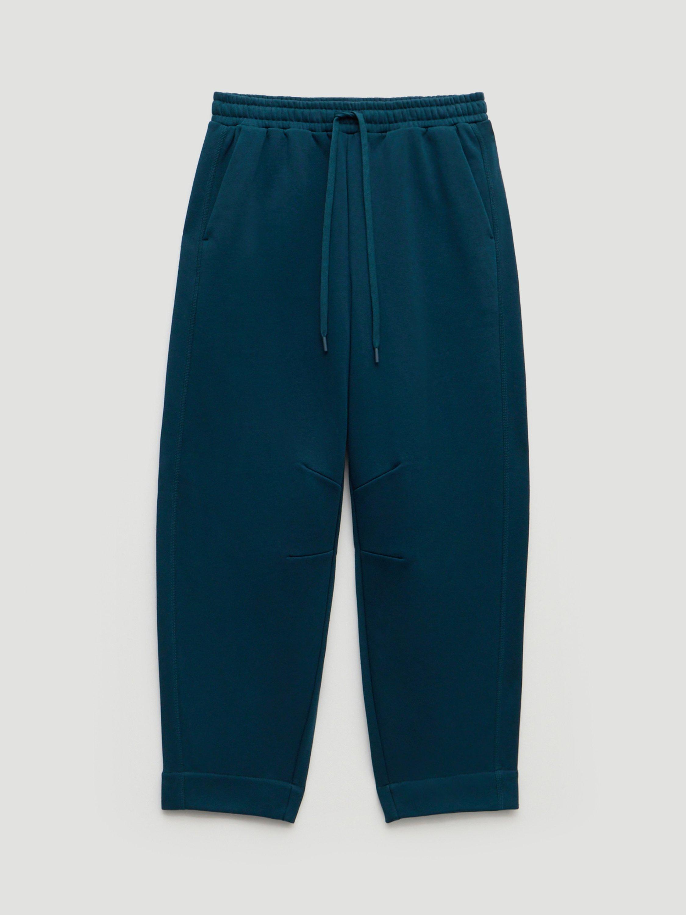 Product image 4 of 5, which shows HUSH Barrel Leg Jersey Joggers, Teal Blue, XS-S