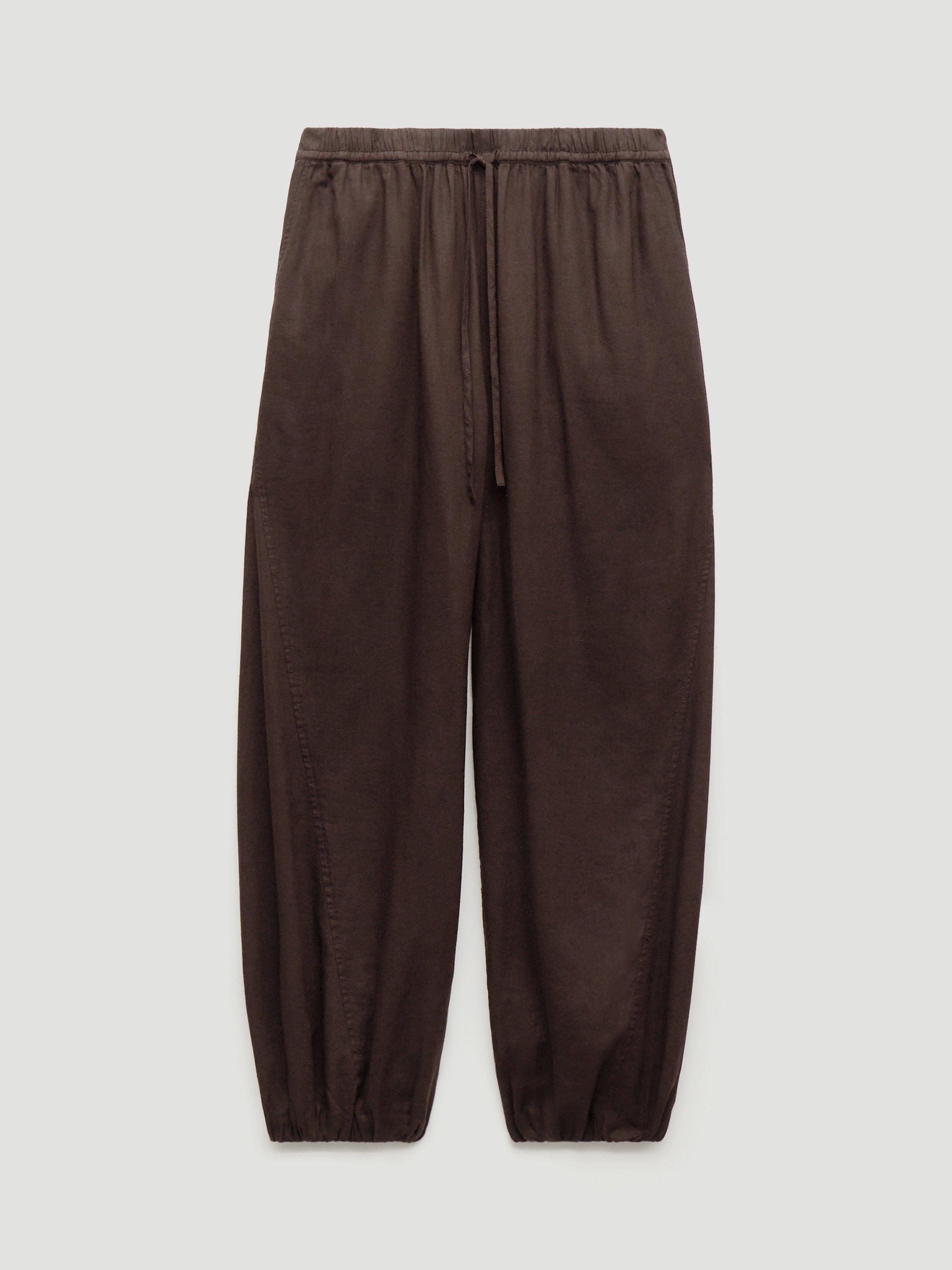 Product image 4 of 7, which shows HUSH Tove Beach Trousers, Dark Brown, L-XL