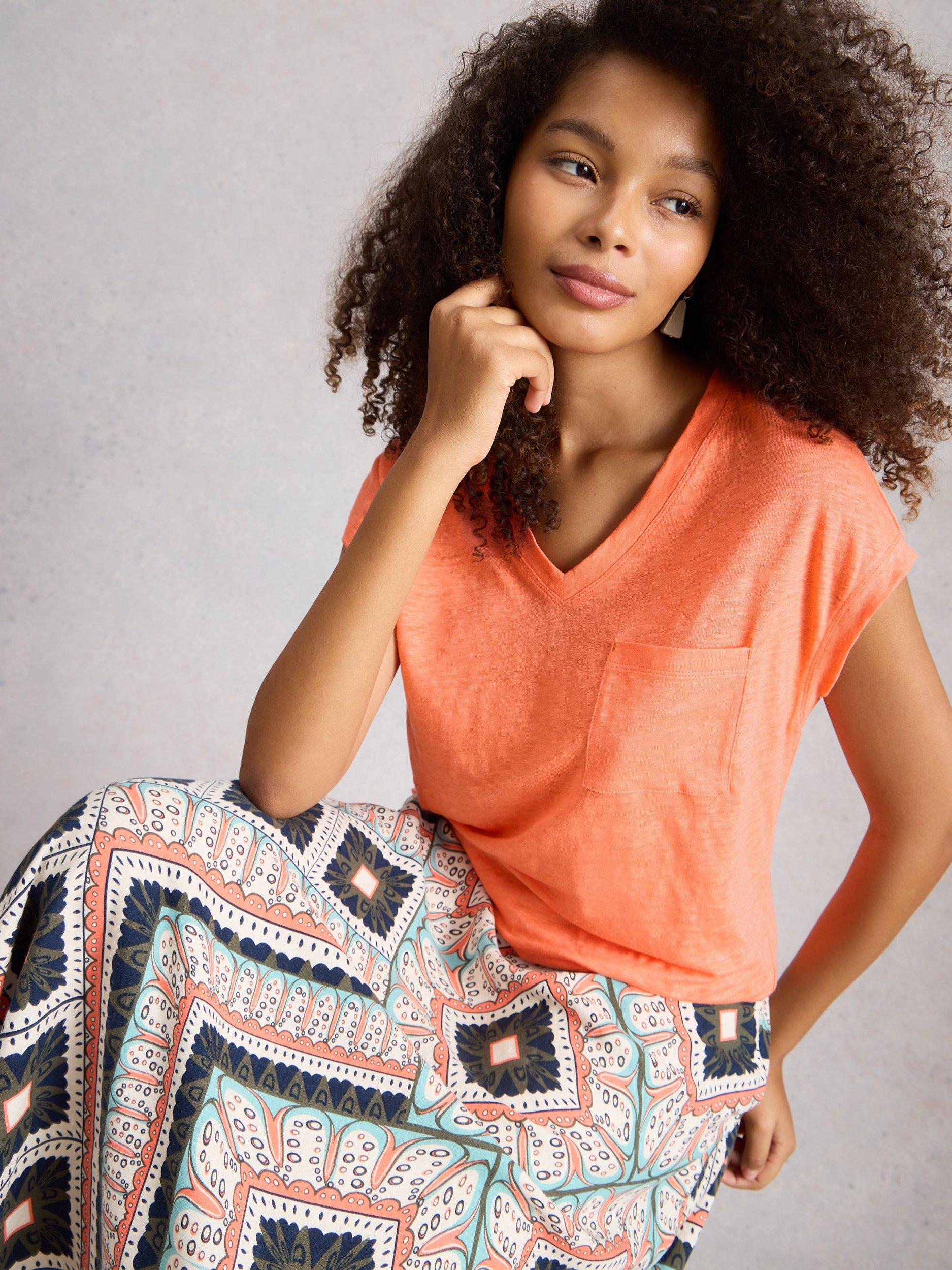 Product image 4 of 6, which shows White Stuff Iris V-Neck Pure Linen T-Shirt, Coral, 6