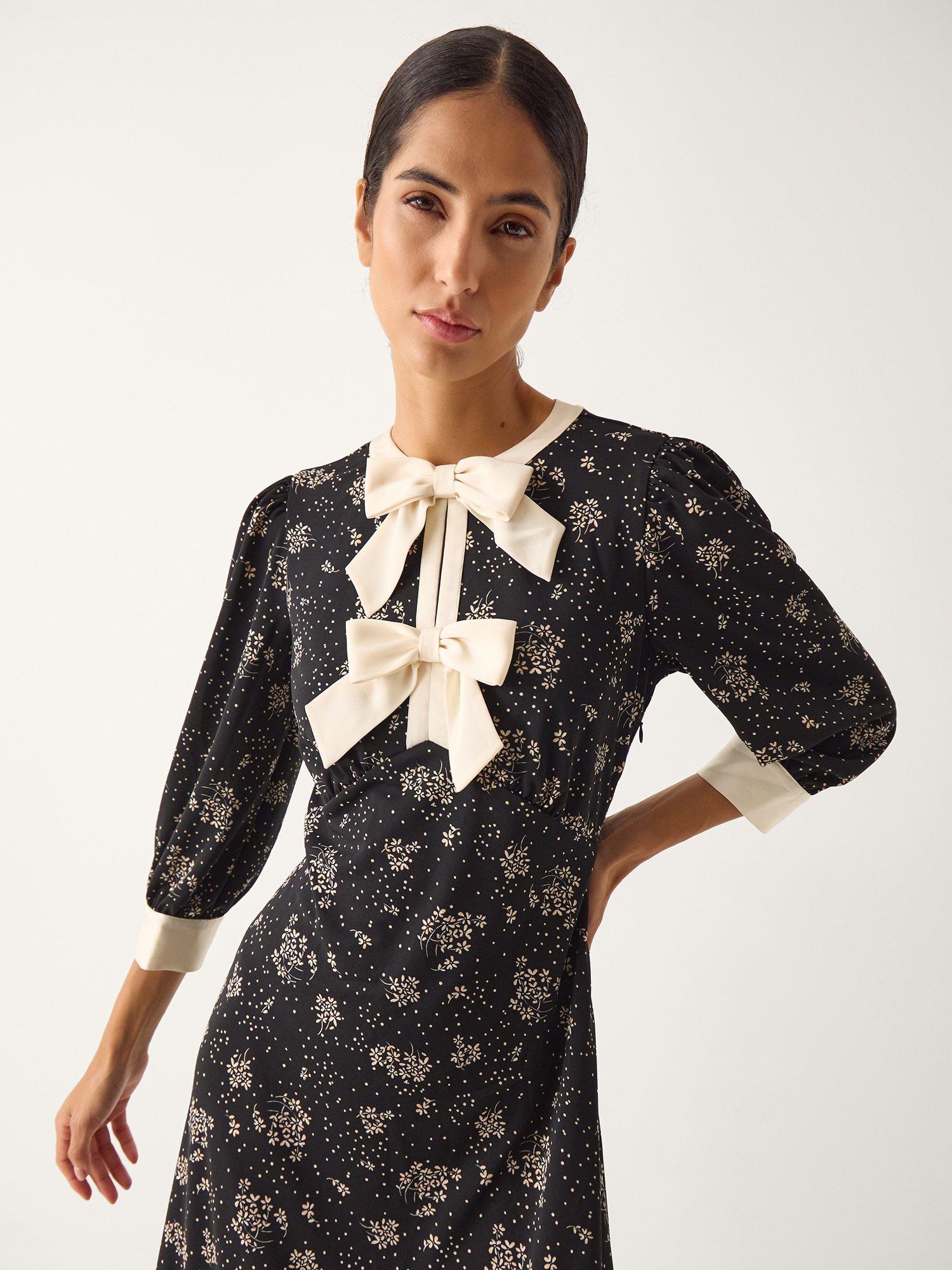 Product image 3 of 5, which shows Monsoon Dotty Bow Floral Jersey Midi Dress, Black, S