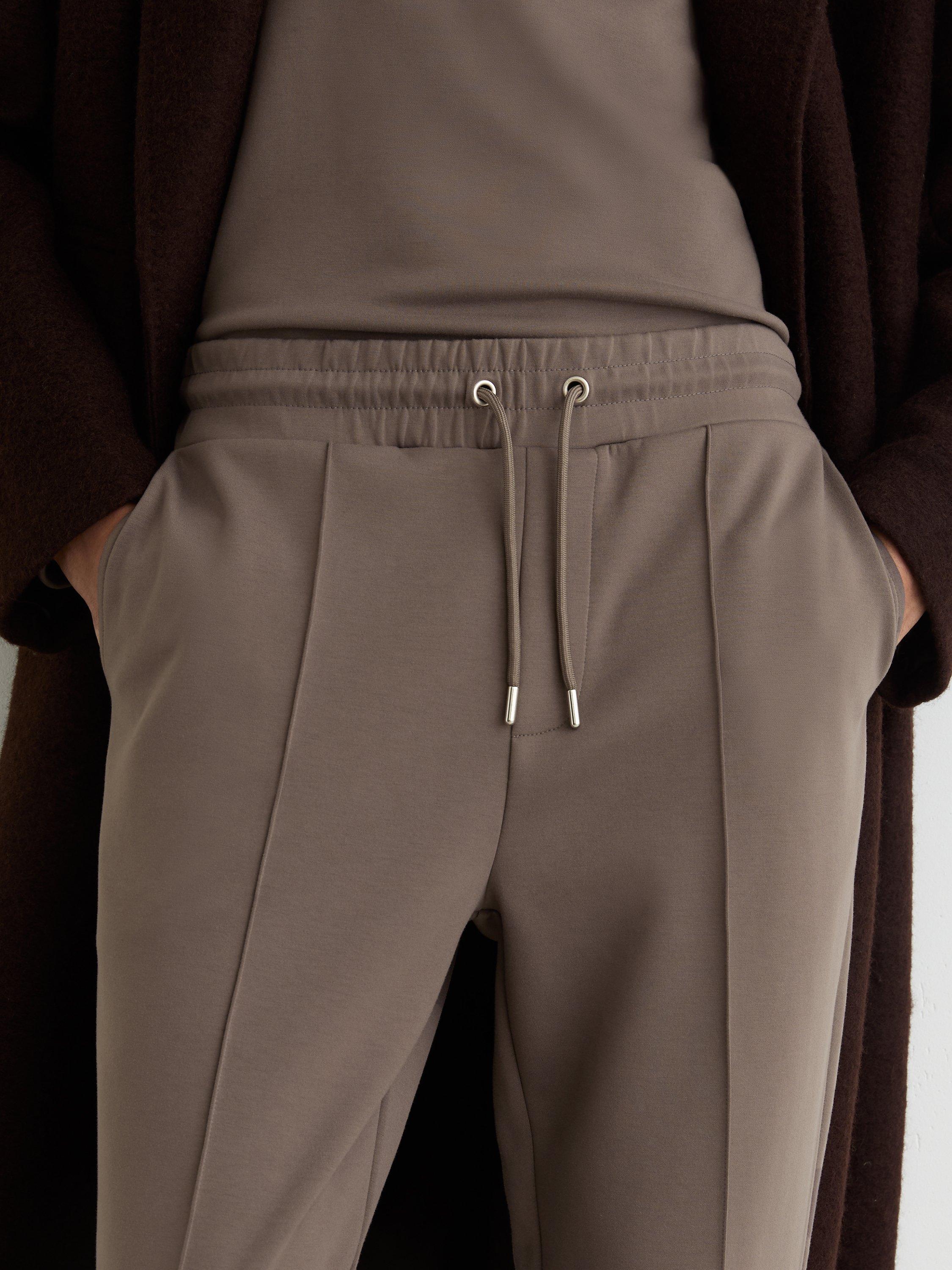 Product image 5 of 5, which shows Reiss Premier Premium Interlock Jersey Joggers, Light Brown, XS