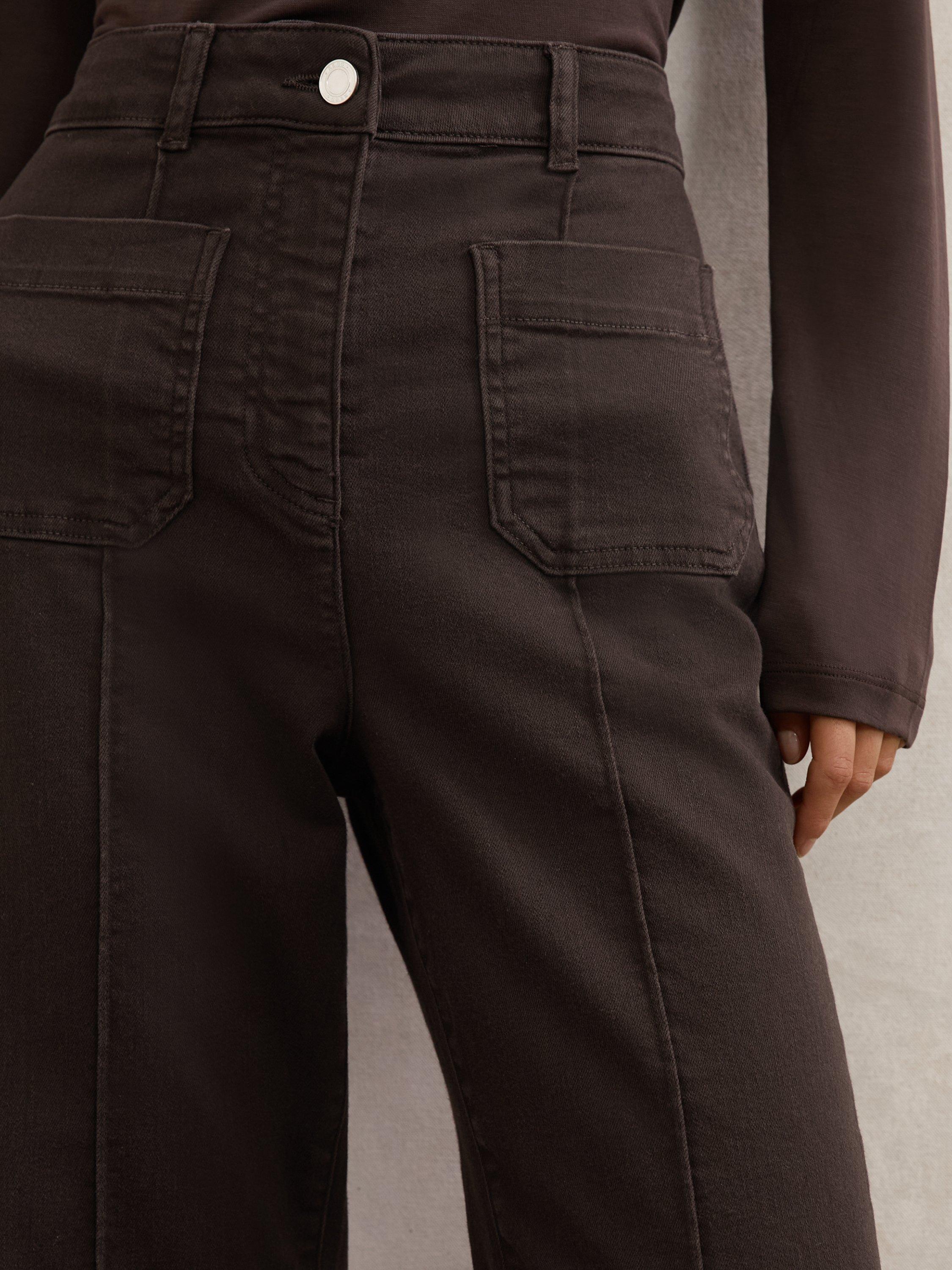 Product image 2 of 5, which shows Reiss Sakura Patch Pocket Flared Jeans, Chocolate Brown, 25R