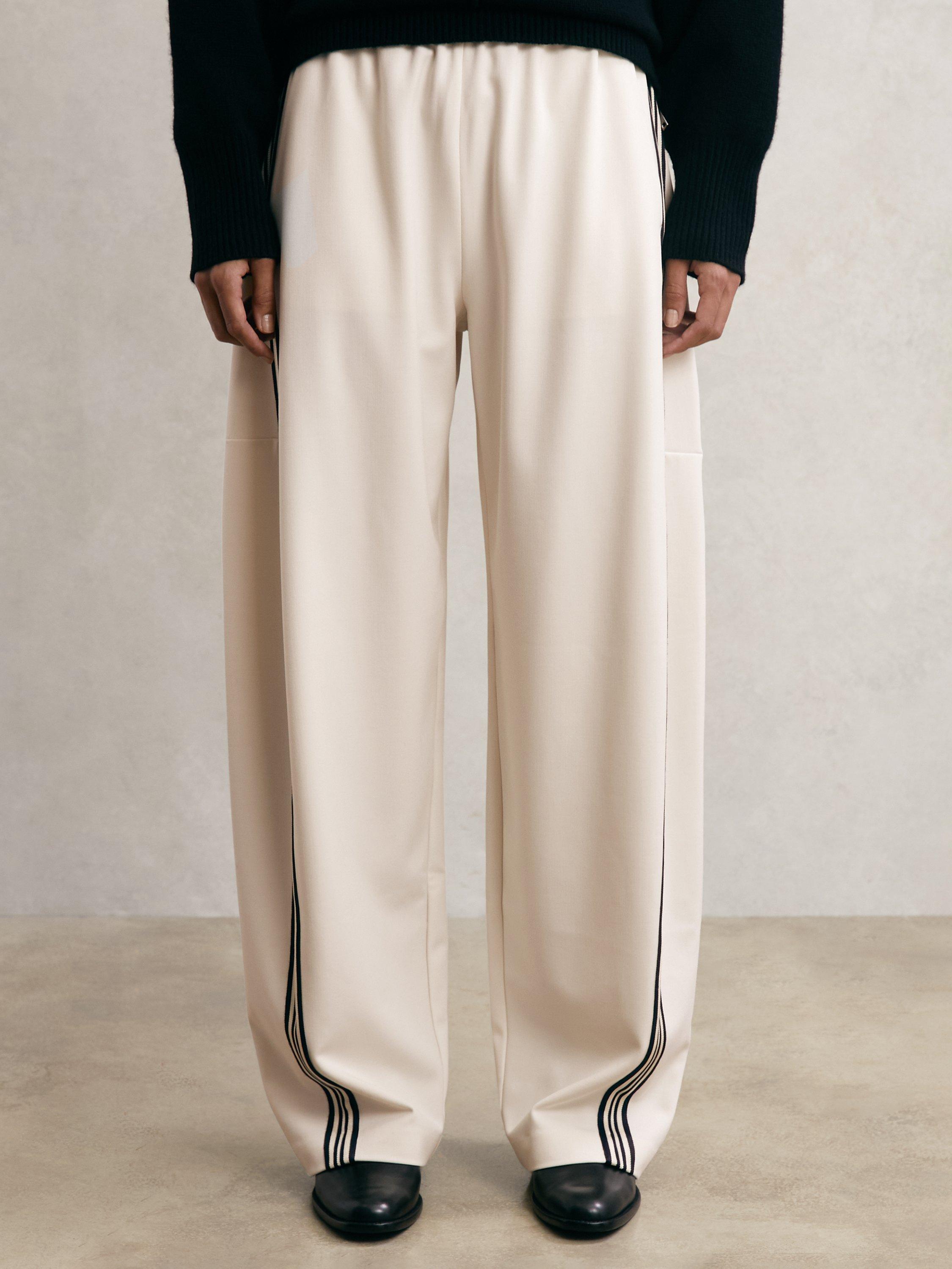 Product image 4 of 5, which shows Reiss Petite Elle Side Stripe Trousers, Cream, 6Pt