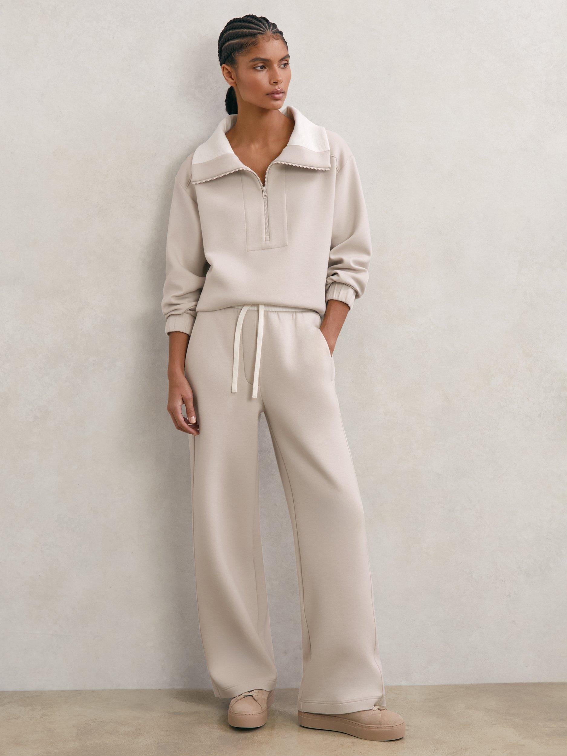 Product image 1 of 5, which shows Reiss Petite Laney Wide Leg Joggers, Stone Neutral, XS