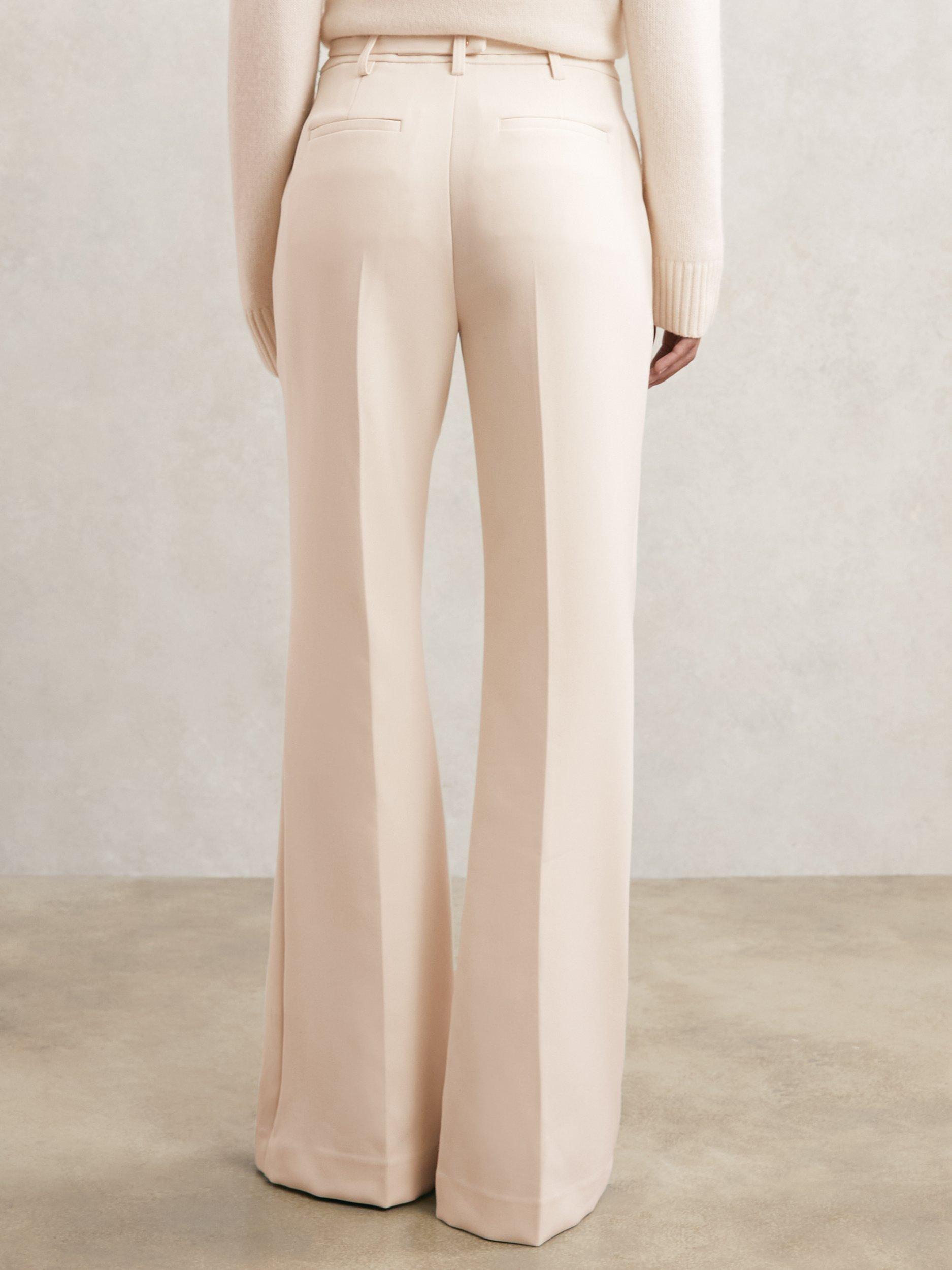 Product image 2 of 5, which shows Reiss Petite Leona Flared Trousers, Cream, 6Pt