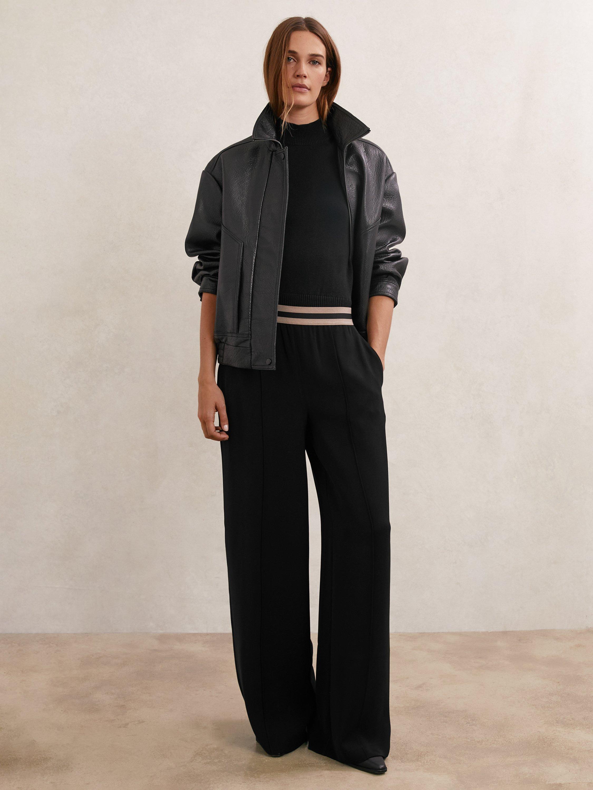 Product image 1 of 5, which shows Reiss Petite Sonnie Wide Leg Trousers, Black, 6Pt