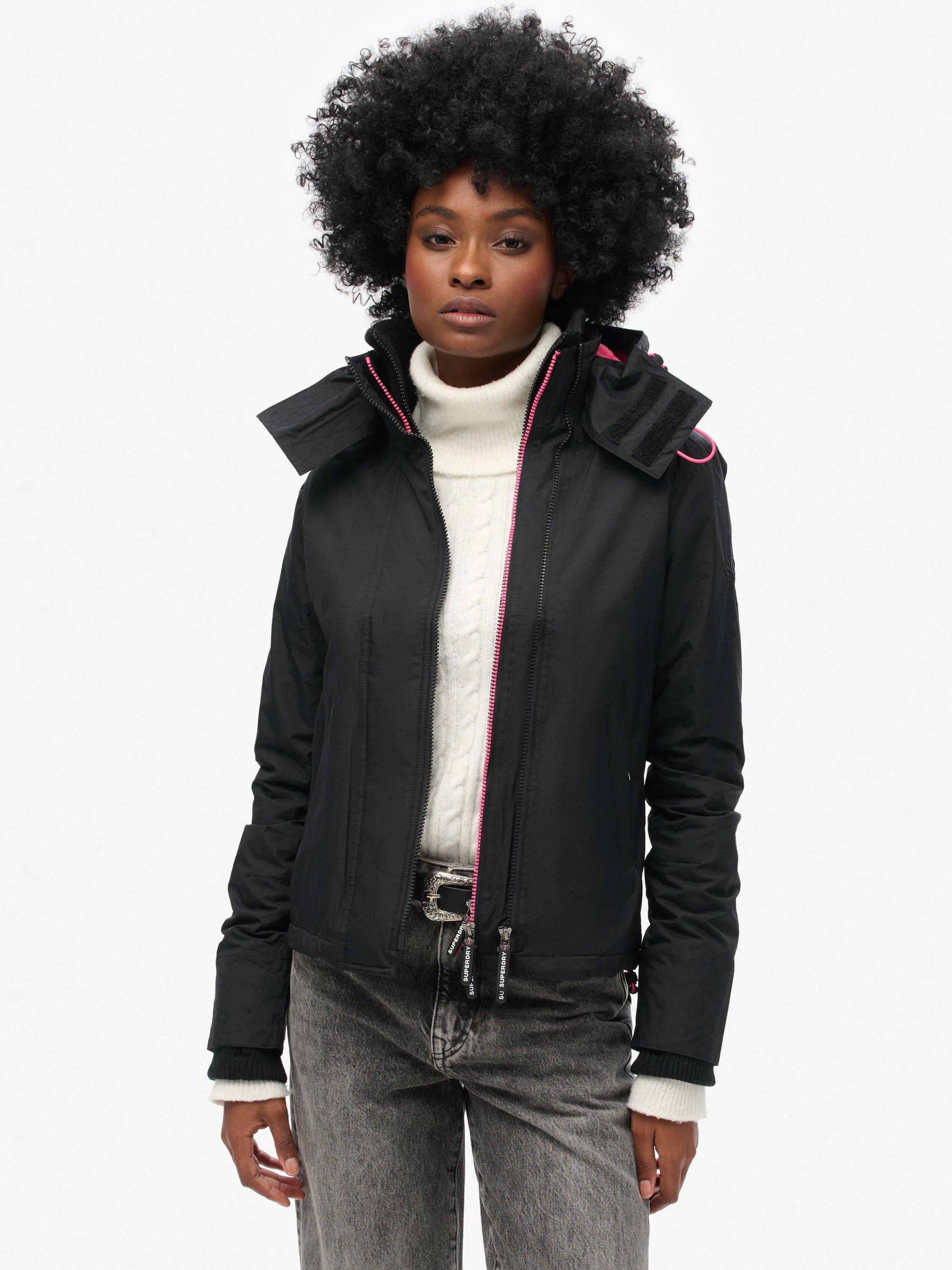Product image 1 of 5, which shows Superdry Pop Zip Hooded Arctic SD-Windcheater Jacket, Black/Punk Pink, 12