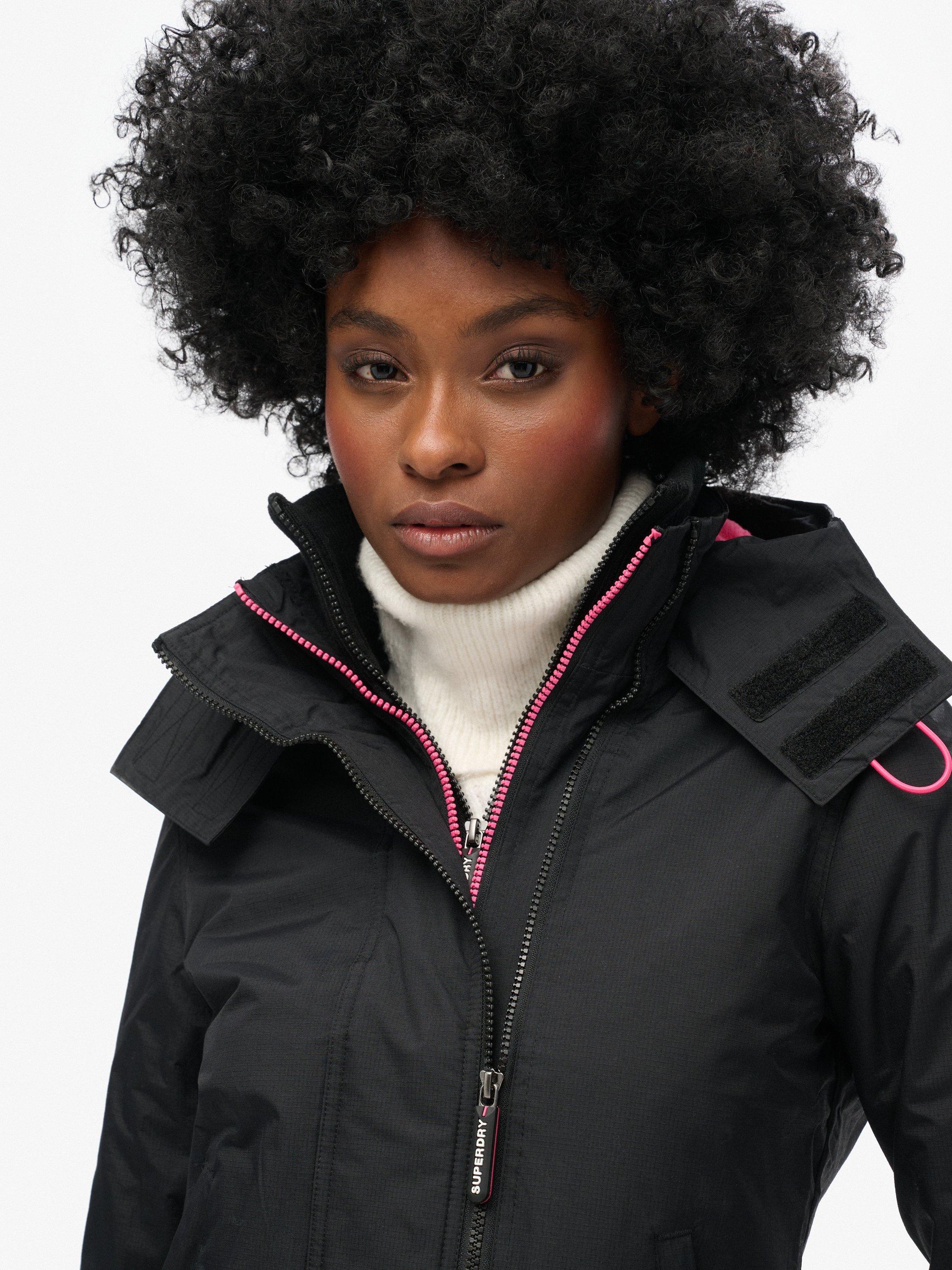 Product image 4 of 5, which shows Superdry Pop Zip Hooded Arctic SD-Windcheater Jacket, Black/Punk Pink, 12