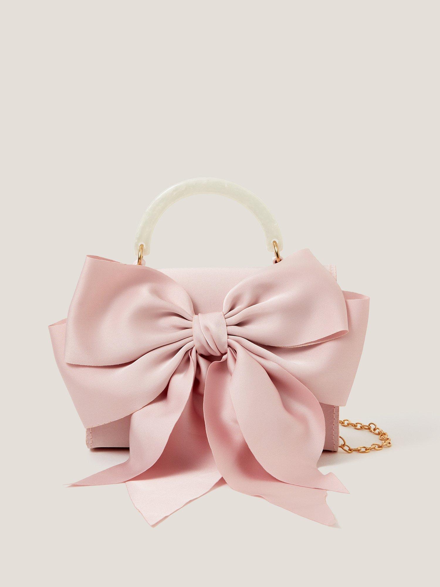 Product image 1 of 4, which shows Monsoon Kids' Satin Bow Bag, Dusky Pink
