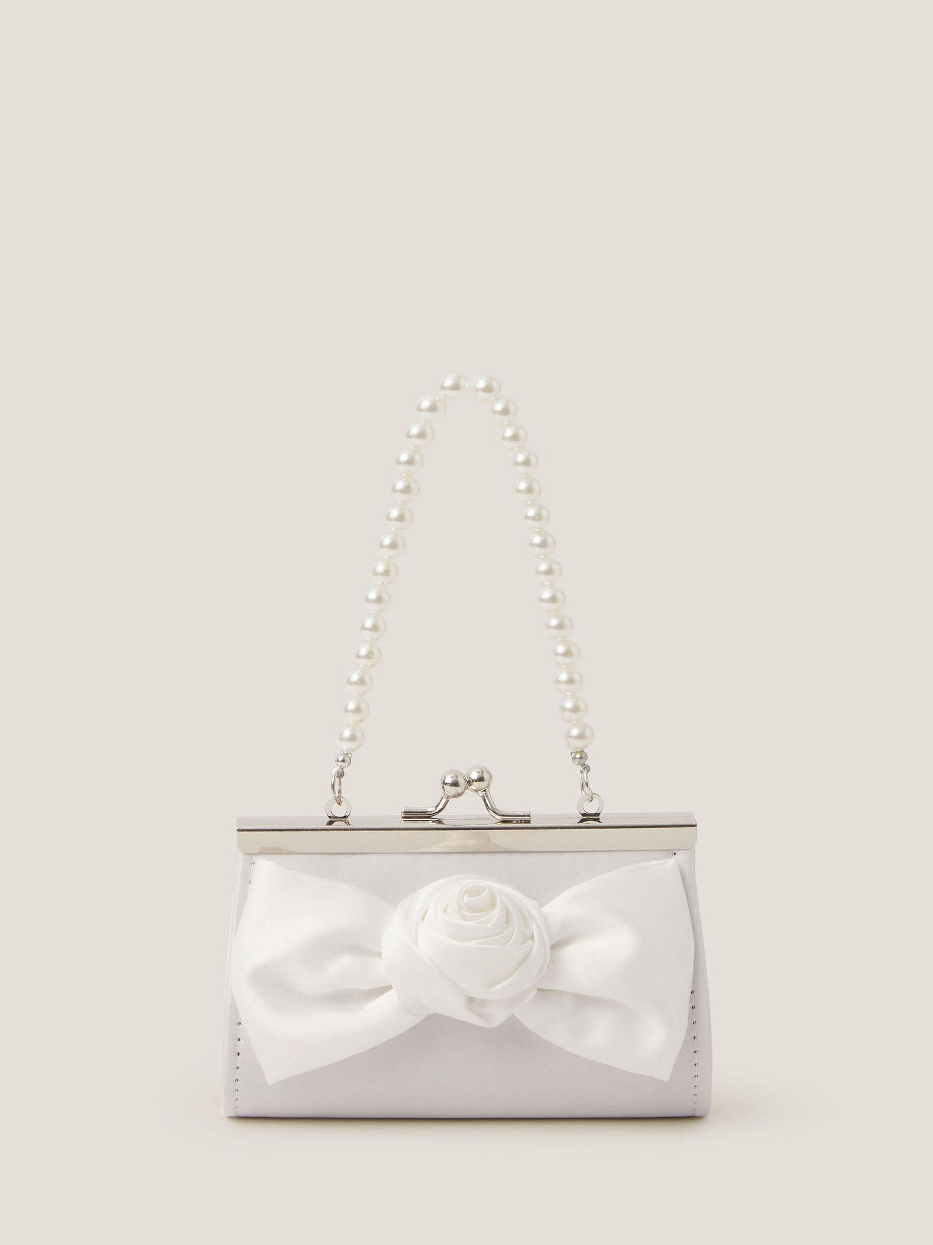 Product image 1 of 4, which shows Monsoon Kids' Satin Rose Bow Mini Bag, Ivory