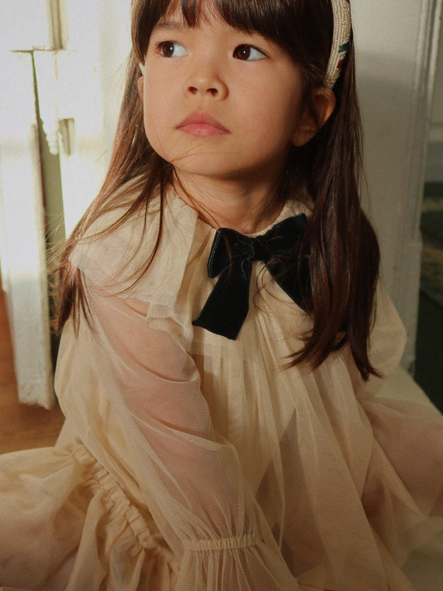 Product image 4 of 5, which shows Konges Sløjd Kids' Bow Dress, Parchment, 18 months