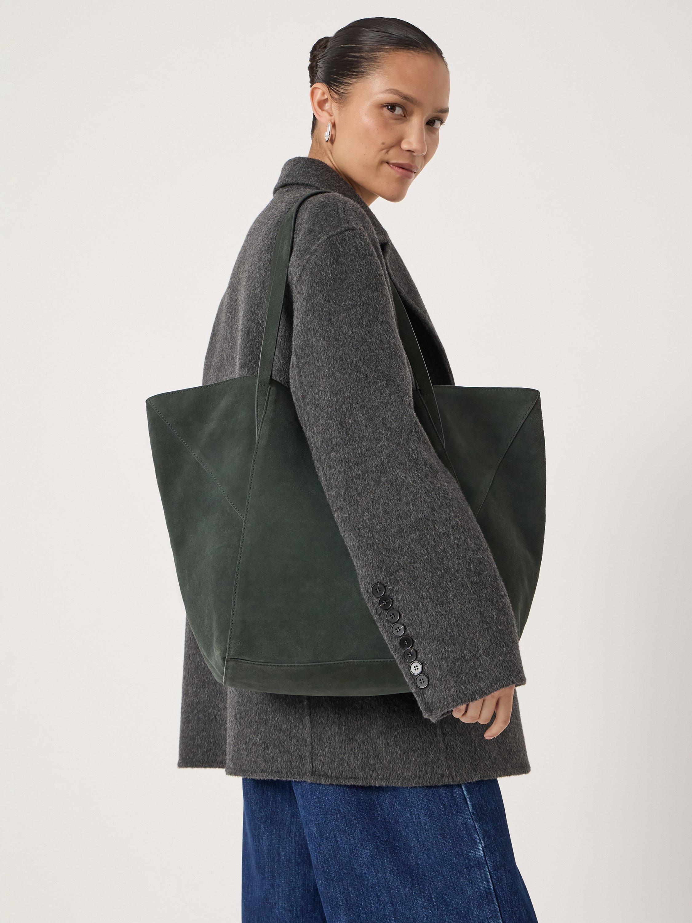 Product image 2 of 6, which shows HUSH Saffie Pure Suede Tote Bag, Green, One Size