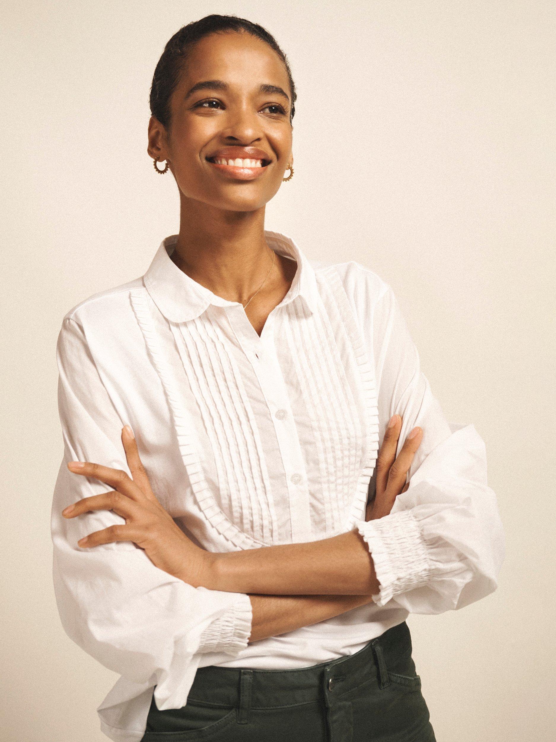 Product image 7 of 8, which shows NRBY Jenna Pleated Bib Shirt, White, XS