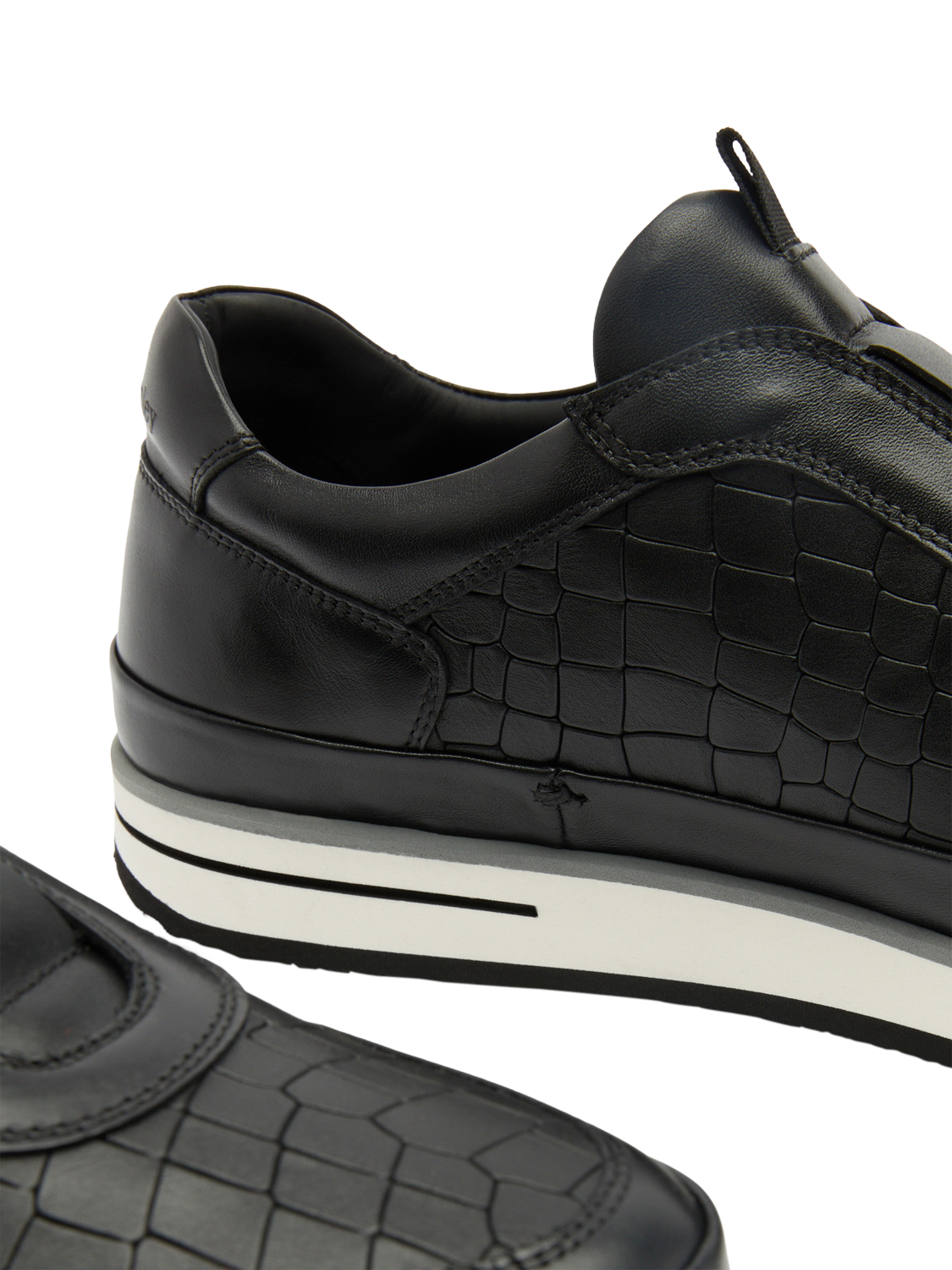 Product image 3 of 7, which shows Russell & Bromley San Giusto Croc-Effect Leather Slip-On Trainers, Black, 12
