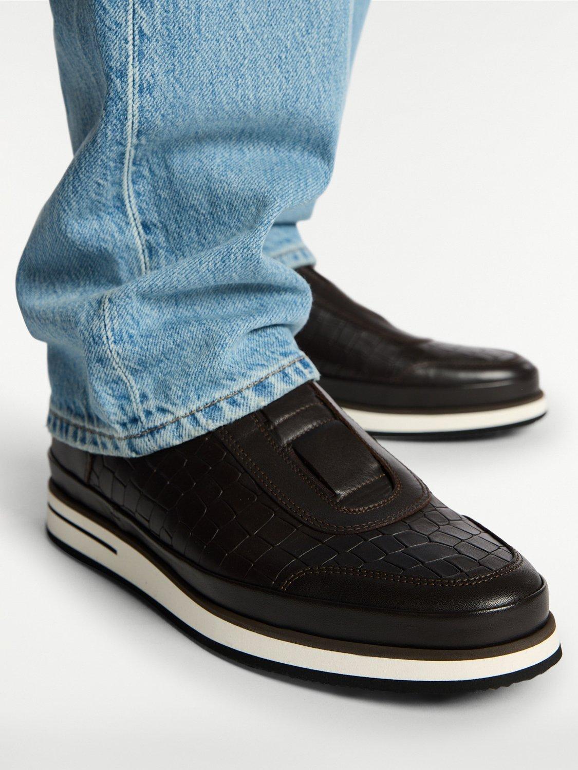 Product image 7 of 7, which shows Russell & Bromley San Giusto Croc-Effect Leather Slip-On Trainers, Black, 12