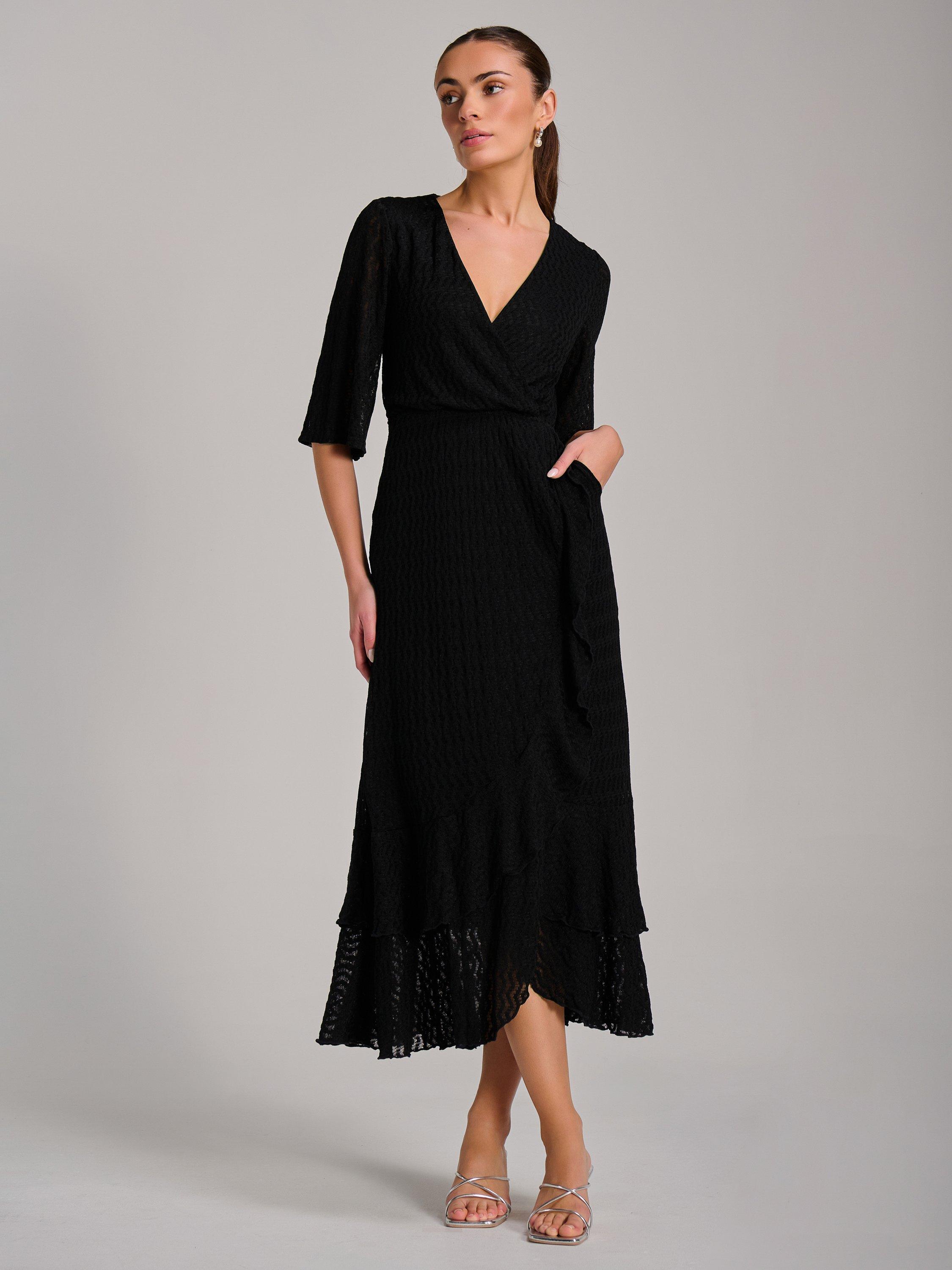 Product image 5 of 7, which shows Jolie Moi Ruffle Hem Knitted Maxi Dress, Black, 8
