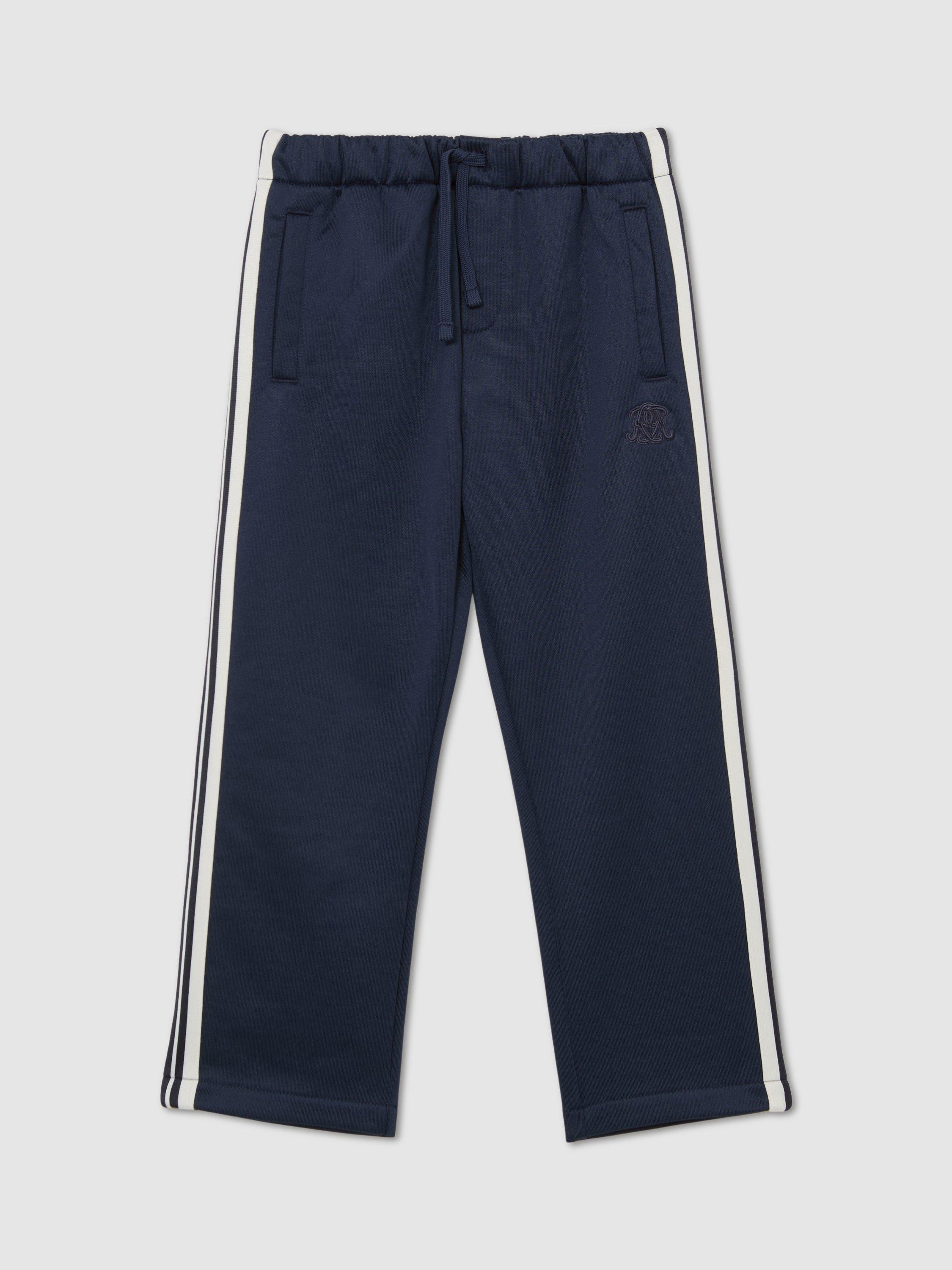 Product image 3 of 5, which shows Reiss Kids' Foster Monogram Side Stripe Joggers, Navy Blue, 3-4 years